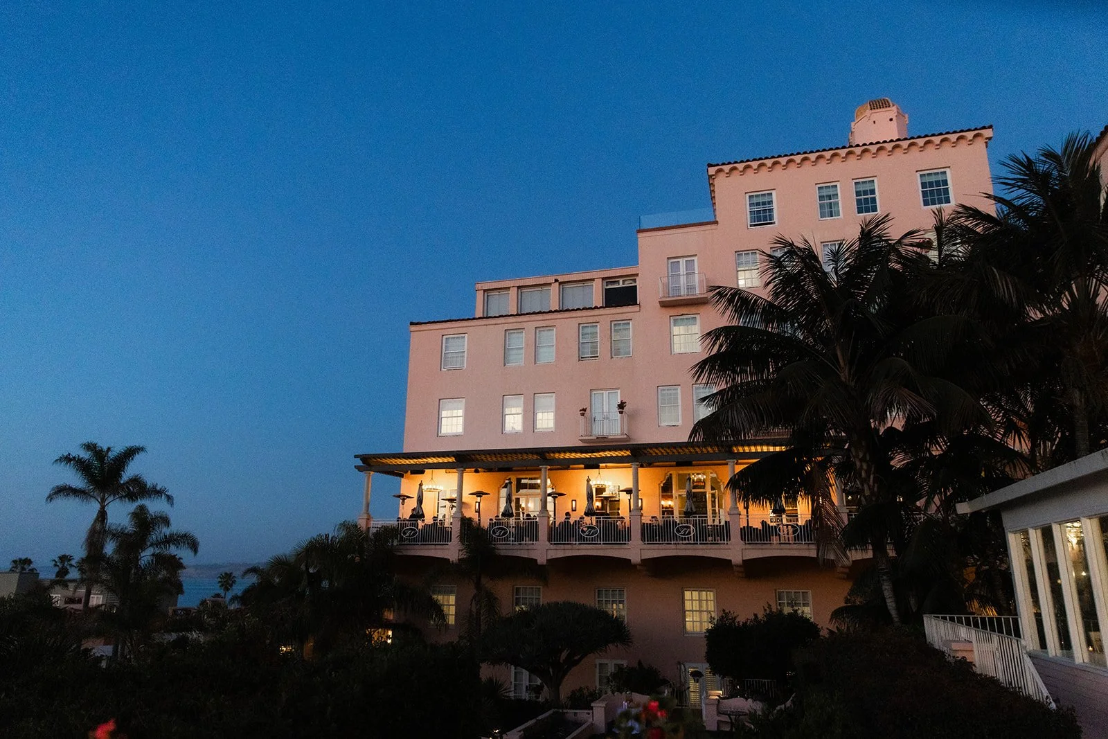Beautiful night shot of La Valencia Hotel in La Jolla, a San Diego coastal wedding venue.