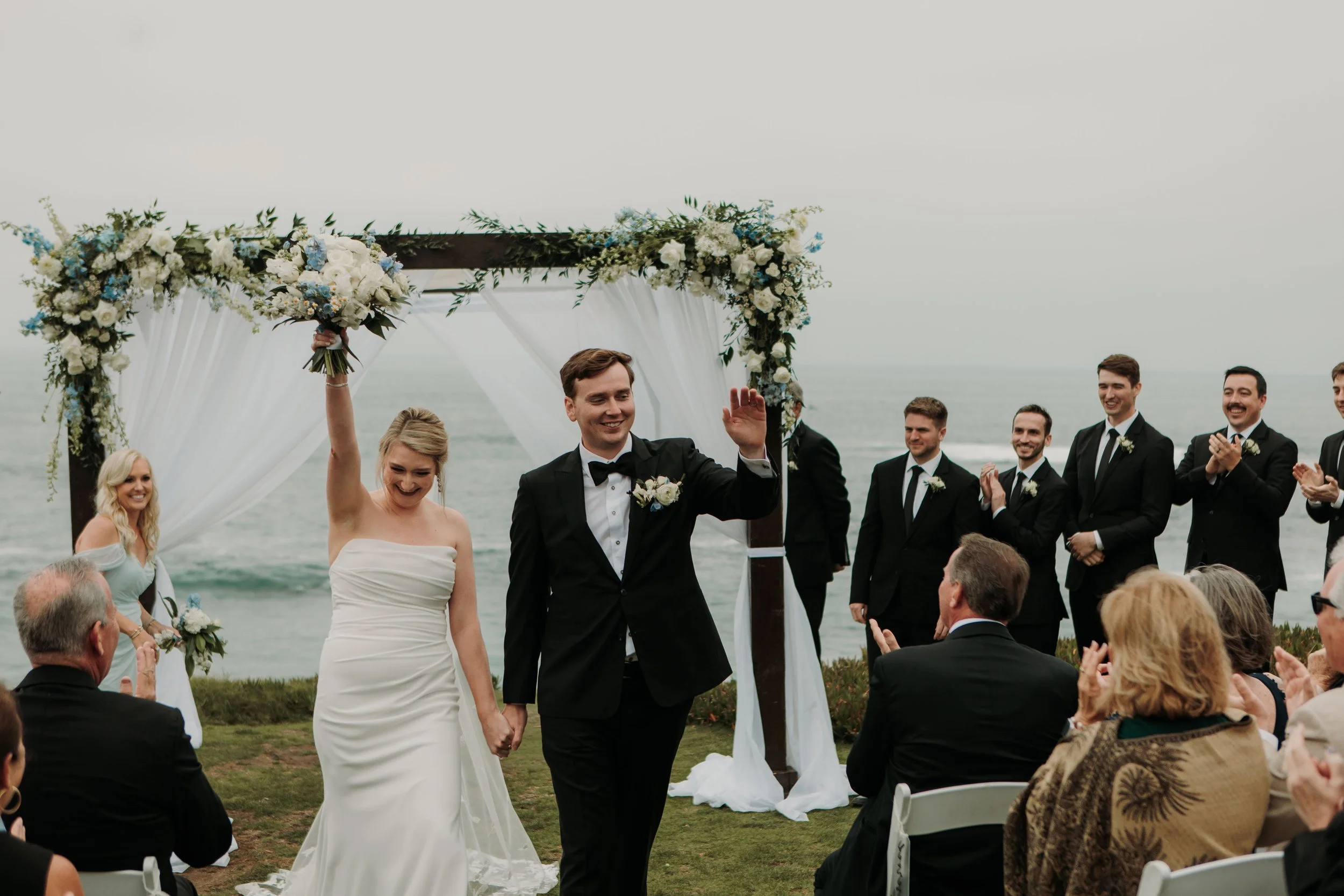 Candid photos of a wedding at The Wedding Bowl and Cuvier Club in La Jolla. San Diego wedding photography by Indigo West Photography.
