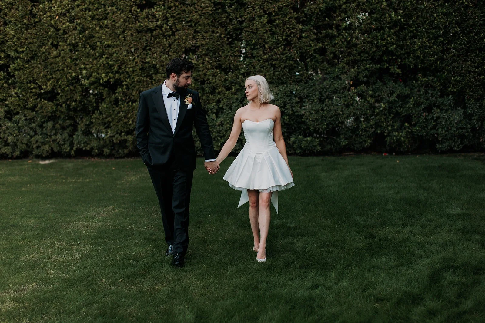 San Diego wedding couple walks hand in hand.
