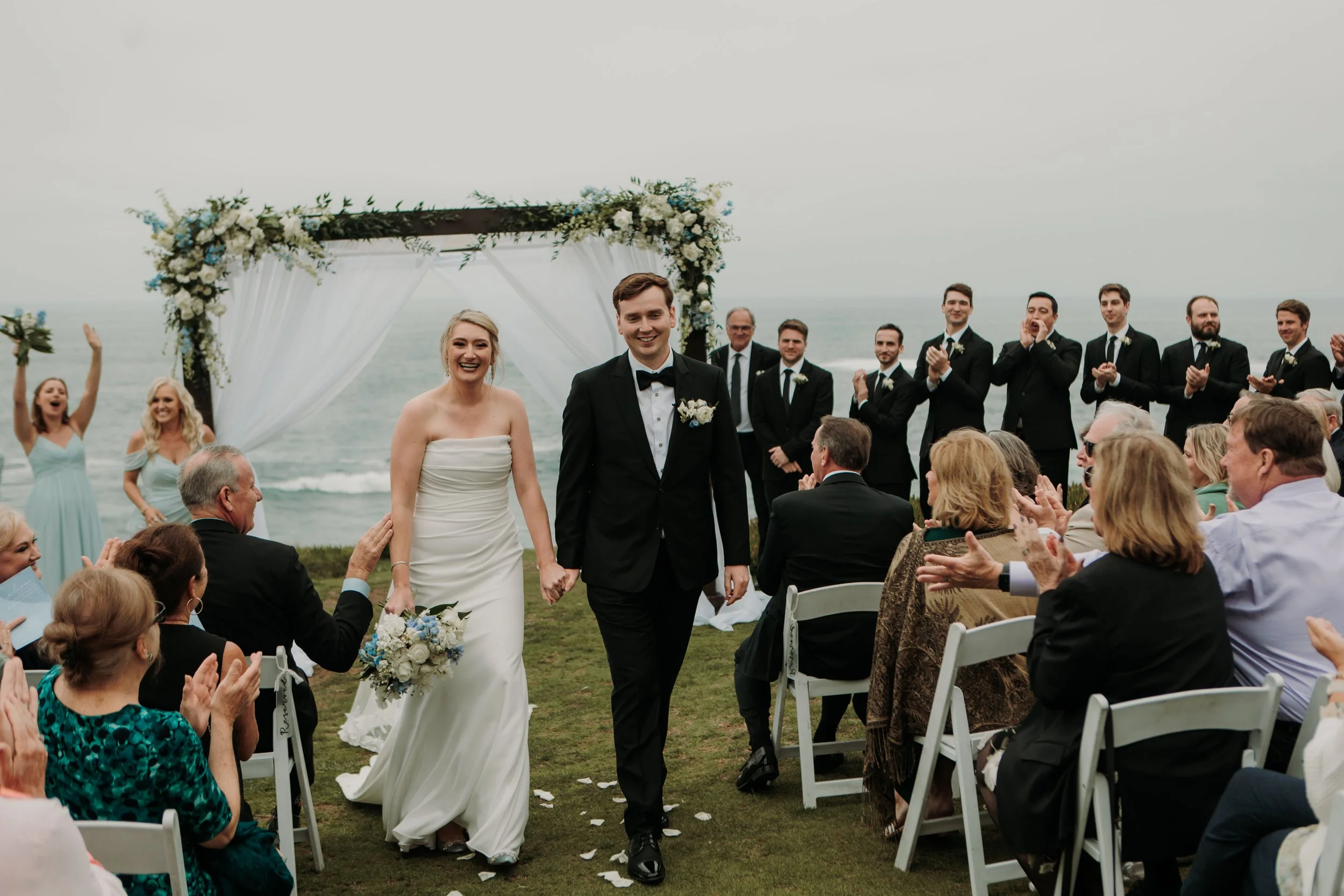 Candid photos of a wedding at The Wedding Bowl and Cuvier Club in La Jolla. San Diego wedding photography by Indigo West Photography.