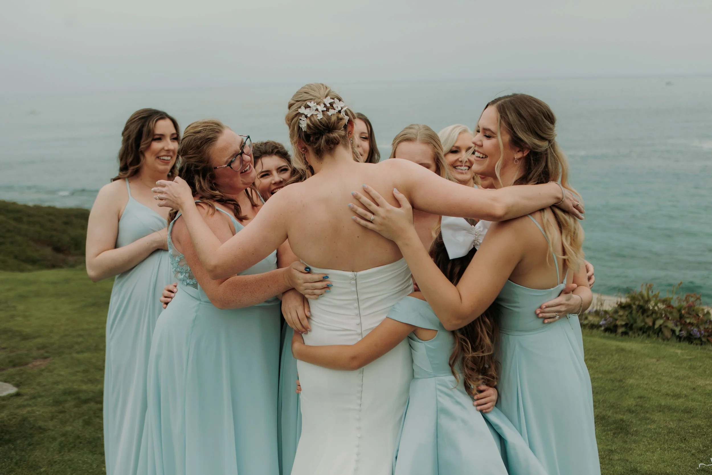 Candid photos of a wedding at The Wedding Bowl and Cuvier Club in La Jolla. San Diego wedding photography by Indigo West Photography.