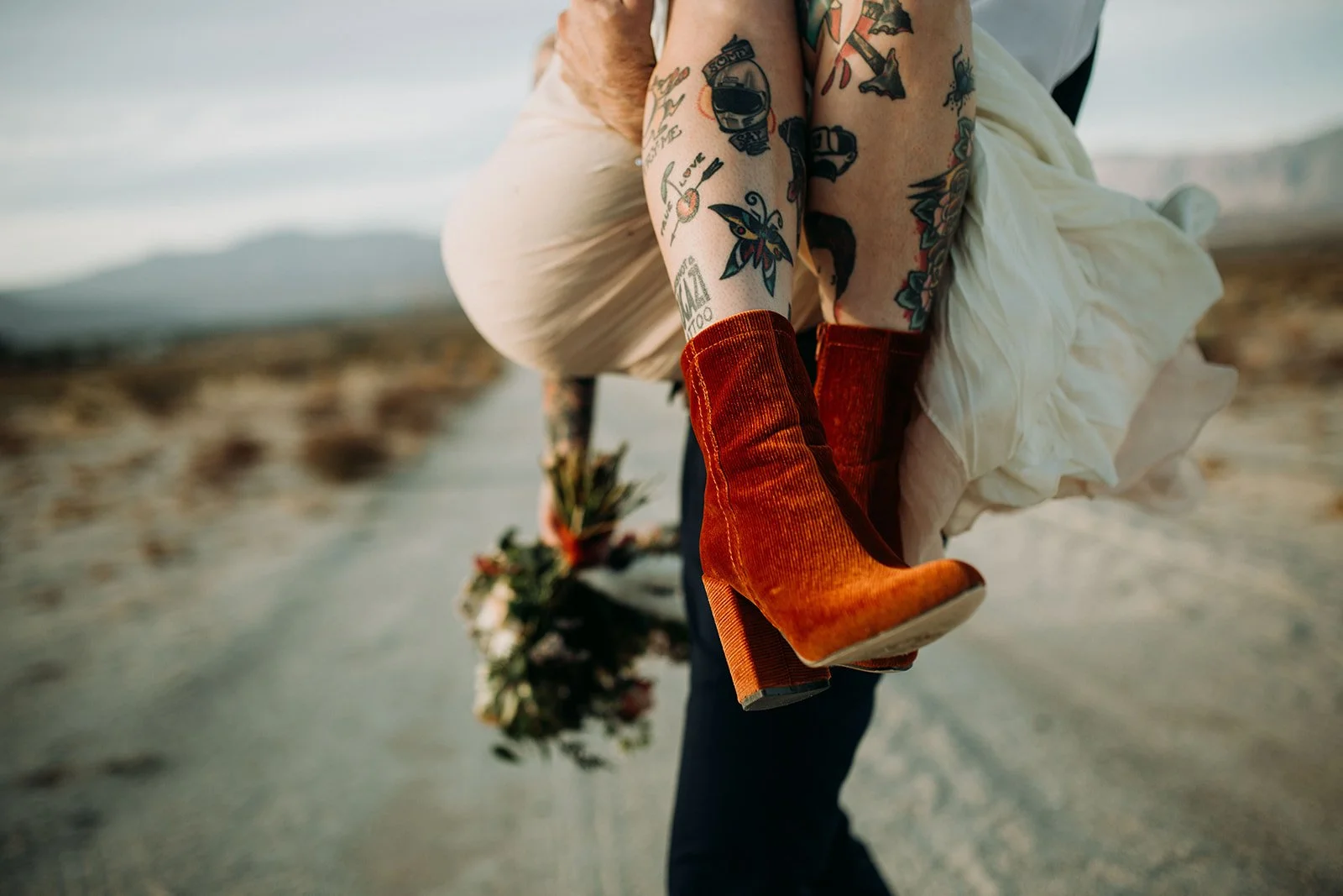 Bride is picked up by the groom during their San Diego elopement wedding.