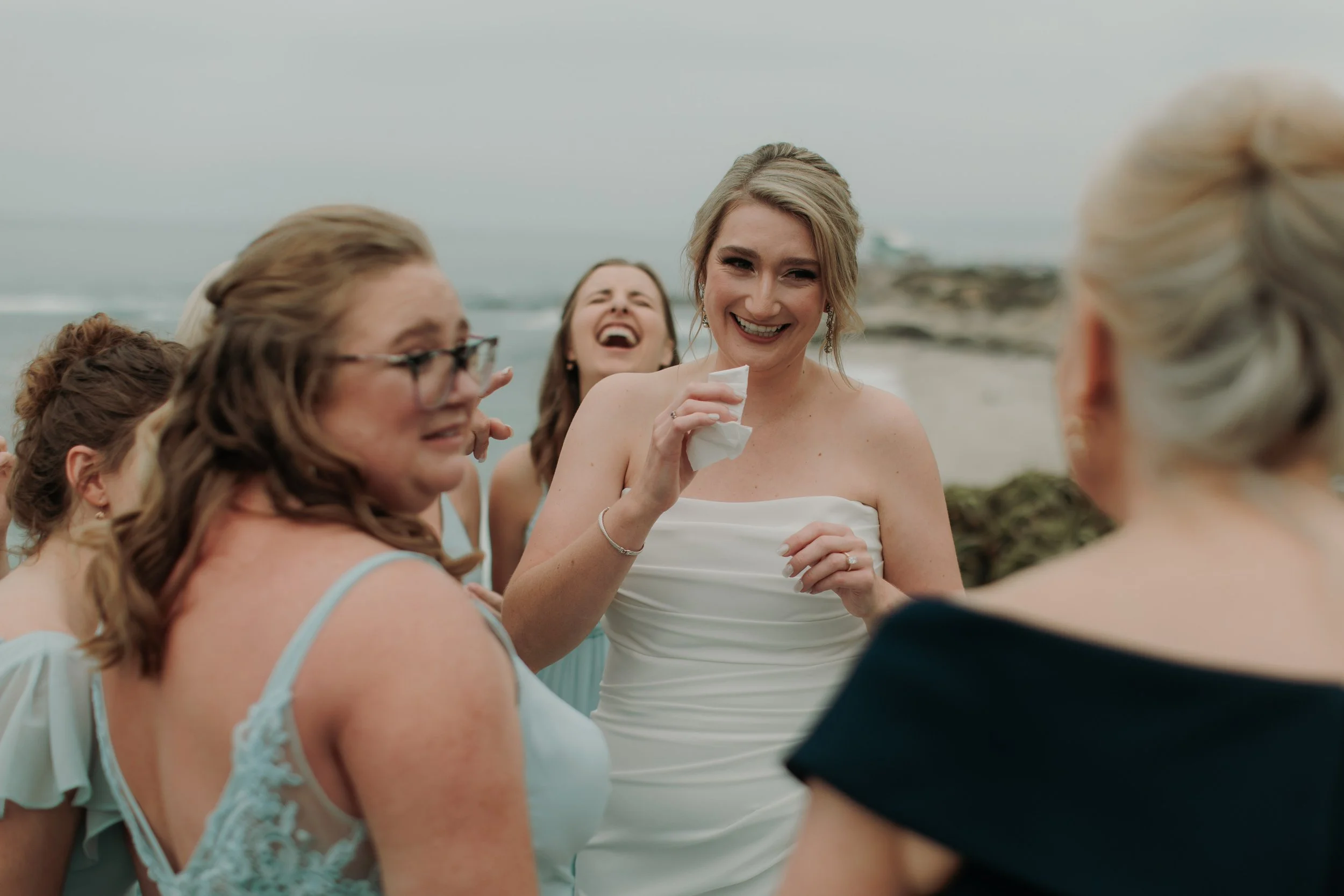 Candid photos of a wedding at The Wedding Bowl and Cuvier Club in La Jolla. San Diego wedding photography by Indigo West Photography.
