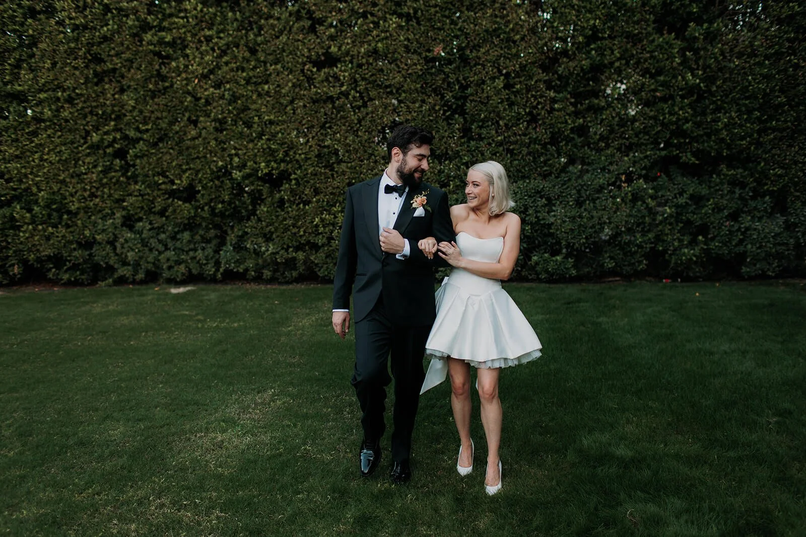 San Diego wedding photography, couple walks in a garden.