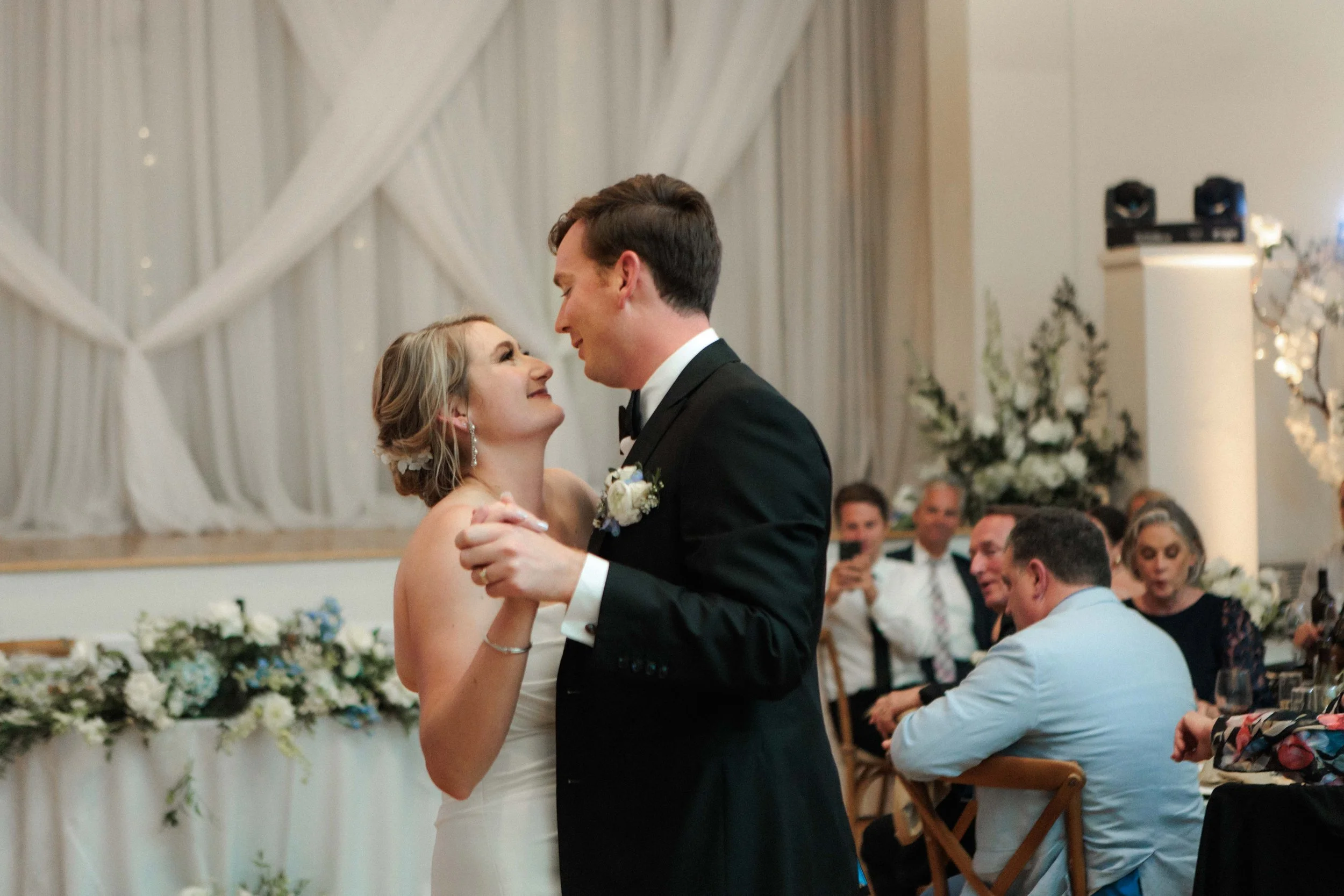 Candid photos of a wedding at The Wedding Bowl and Cuvier Club in La Jolla. San Diego wedding photography by Indigo West Photography.