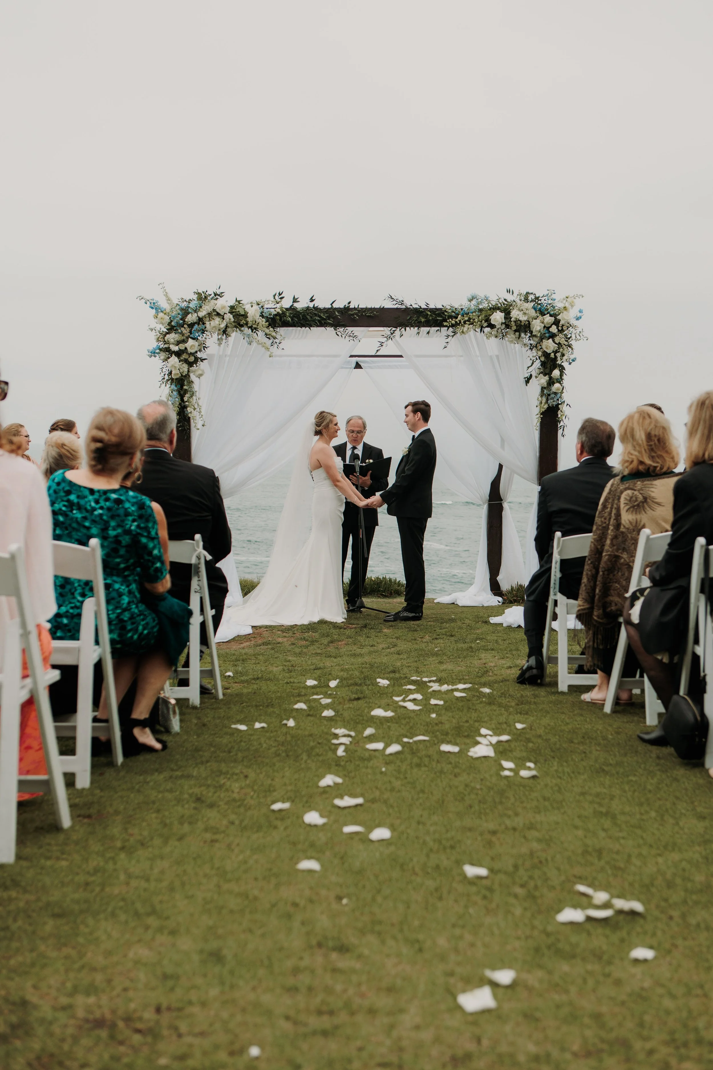Candid photos of a wedding at The Wedding Bowl and Cuvier Club in La Jolla. San Diego wedding photography by Indigo West Photography.