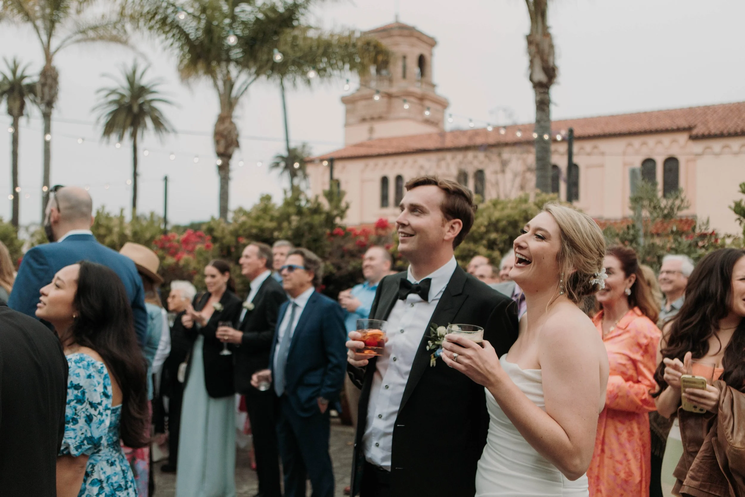 Candid photos of a wedding at The Wedding Bowl and Cuvier Club in La Jolla. San Diego wedding photography by Indigo West Photography.