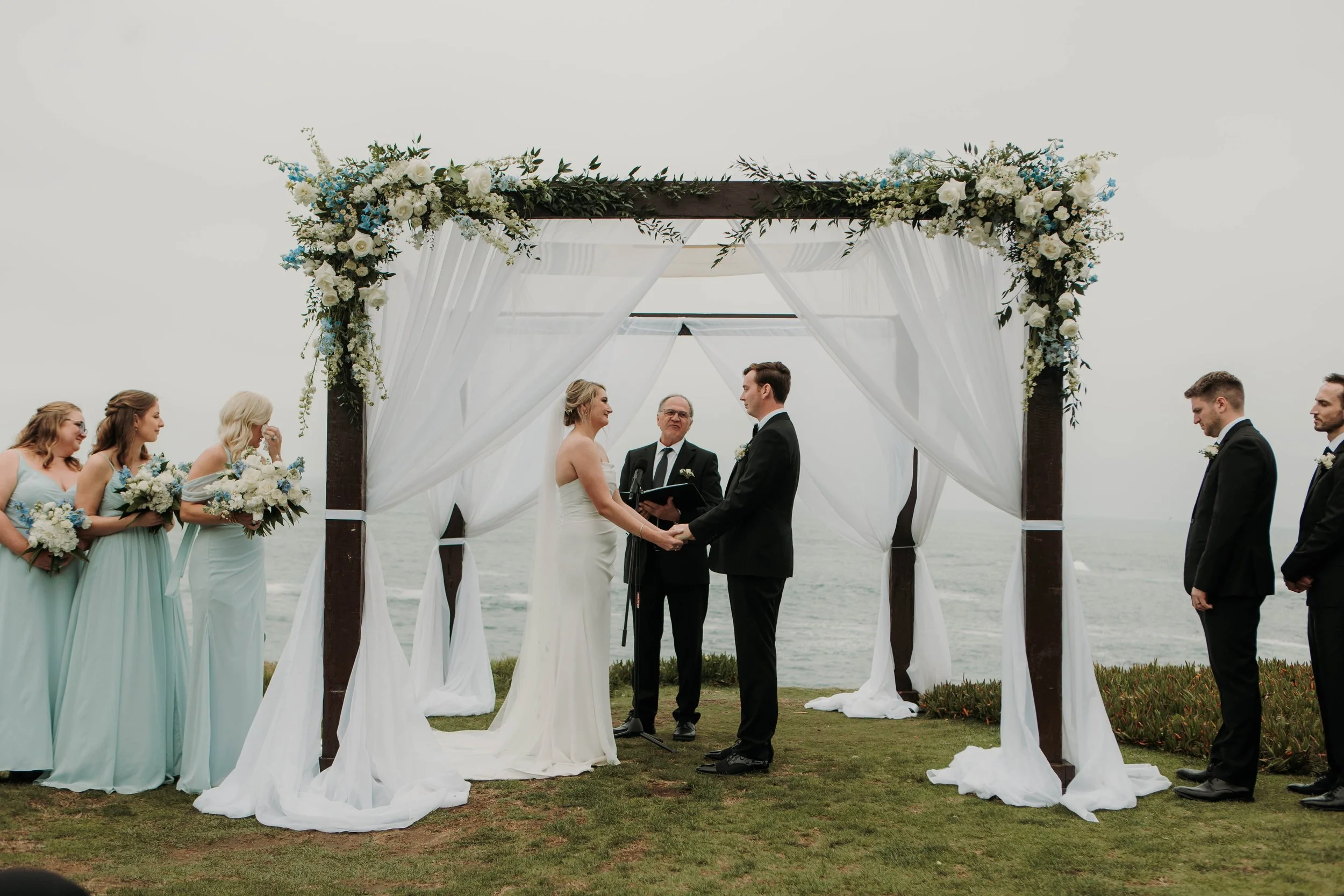 Candid photos of a wedding at The Wedding Bowl and Cuvier Club in La Jolla. San Diego wedding photography by Indigo West Photography.