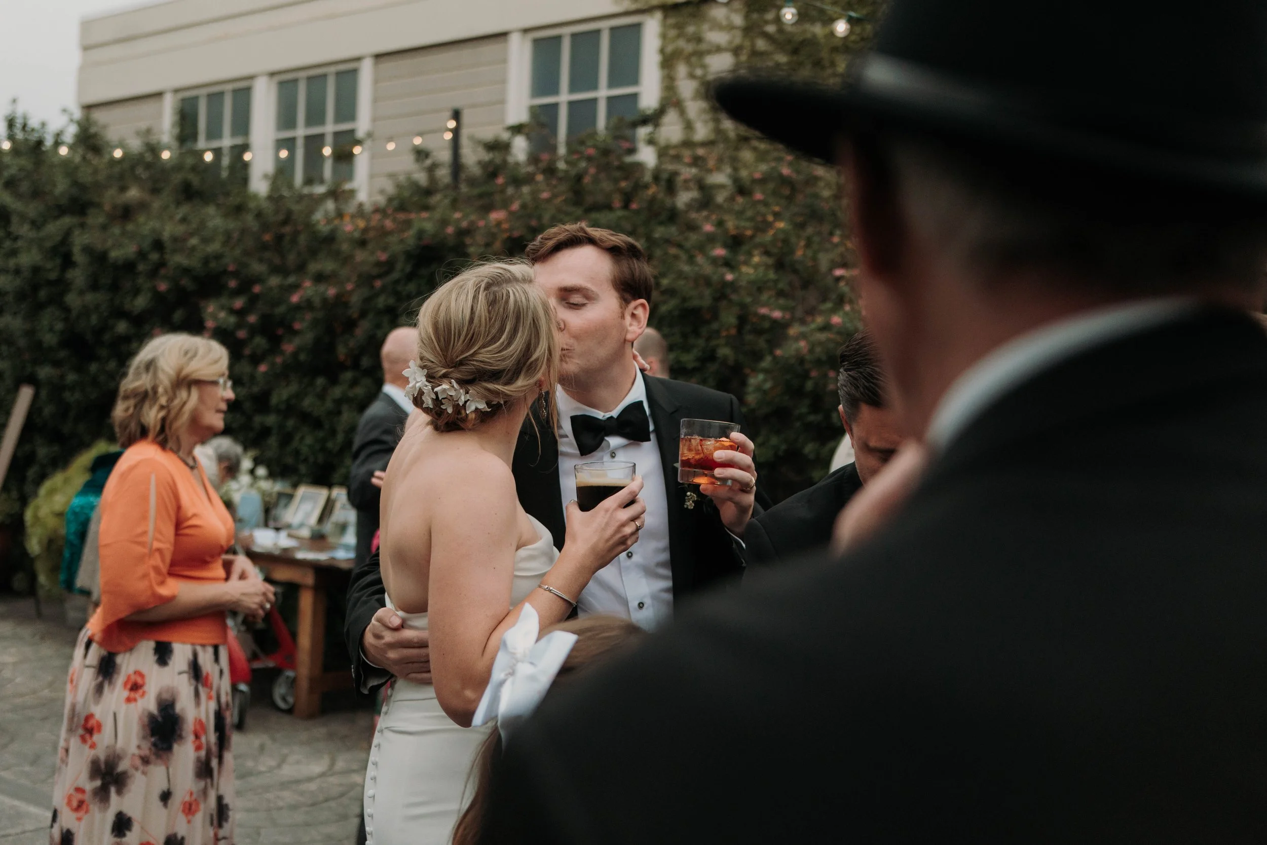 Candid photos of a wedding at The Wedding Bowl and Cuvier Club in La Jolla. San Diego wedding photography by Indigo West Photography.