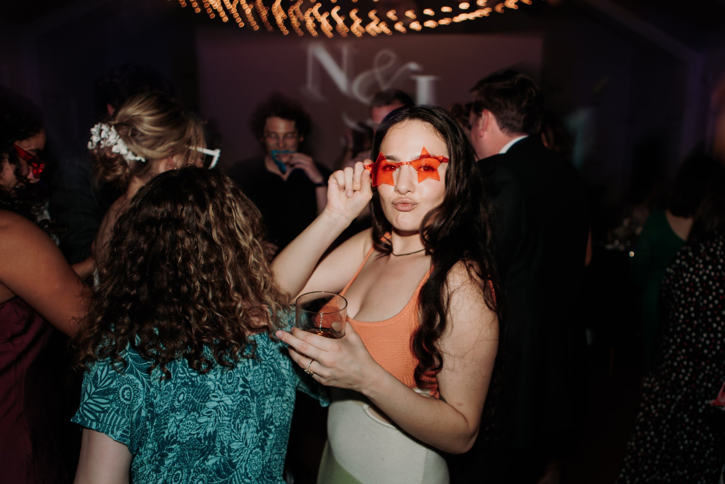 Candid photos of a wedding at The Wedding Bowl and Cuvier Club in La Jolla. San Diego wedding photography by Indigo West Photography.