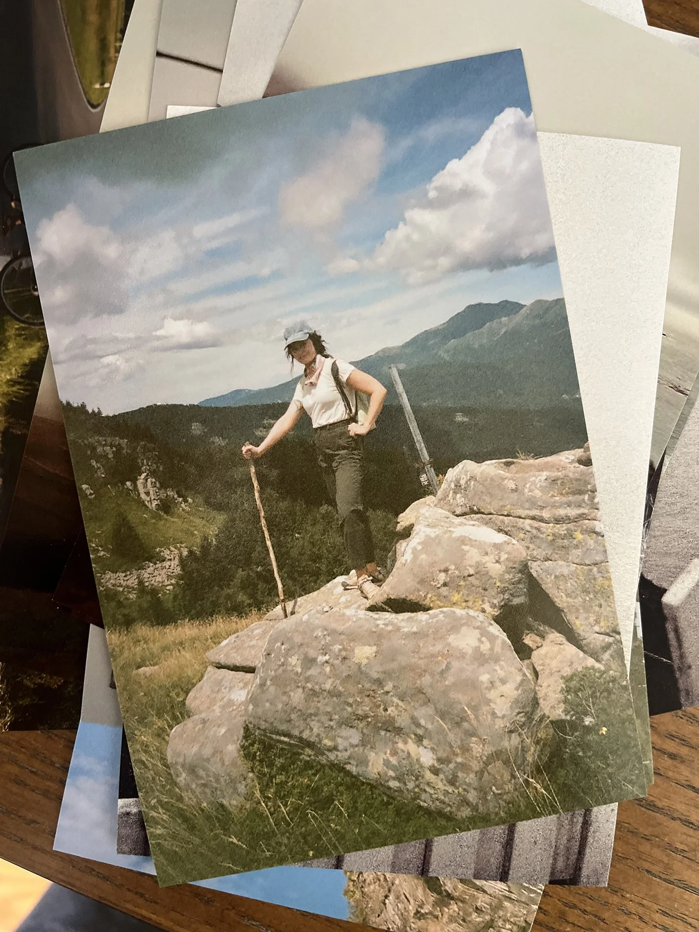 Film photographs of a hike in Italy under cloudy skies.