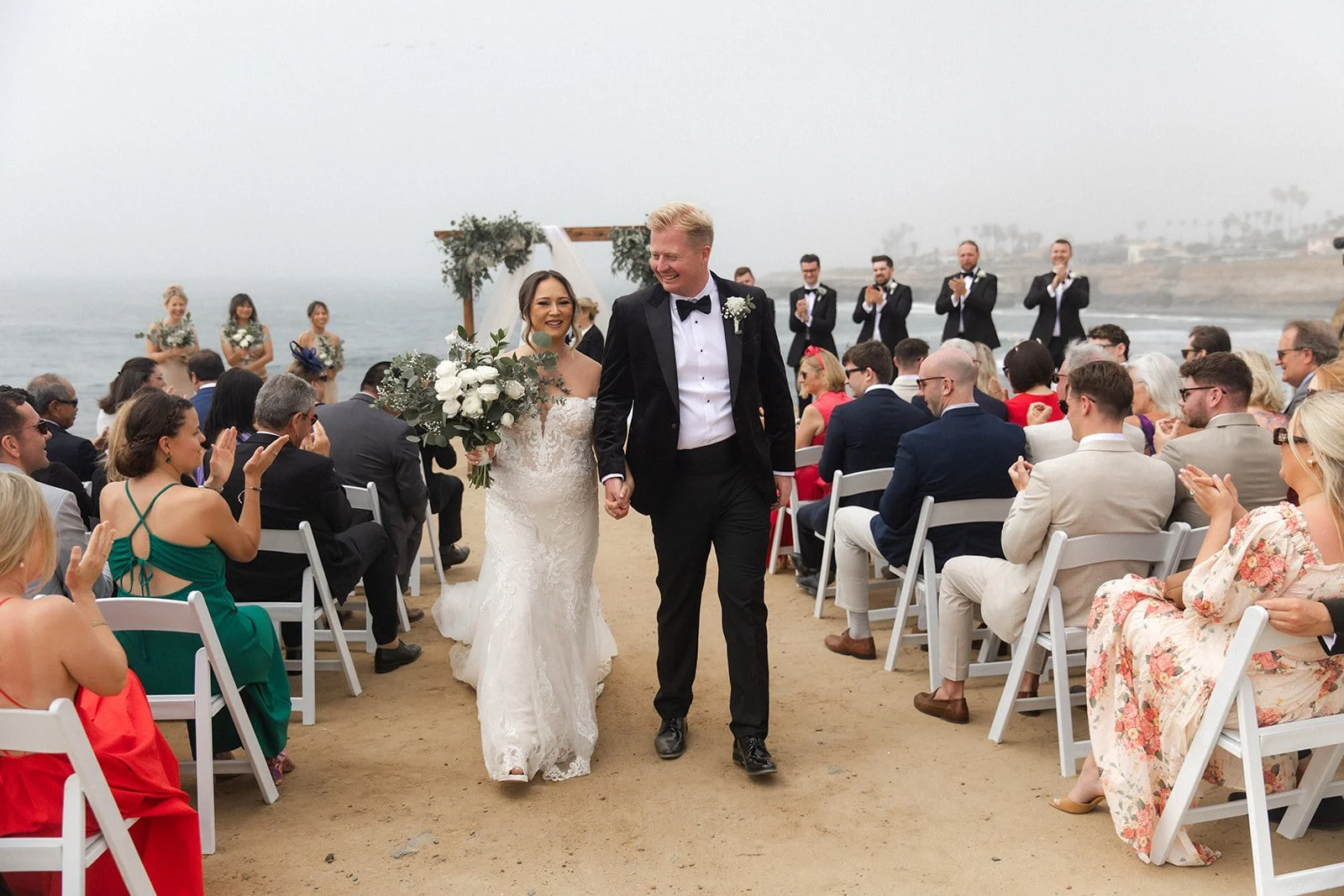 Bride and groom at their San Diego beach wedding ceremony.