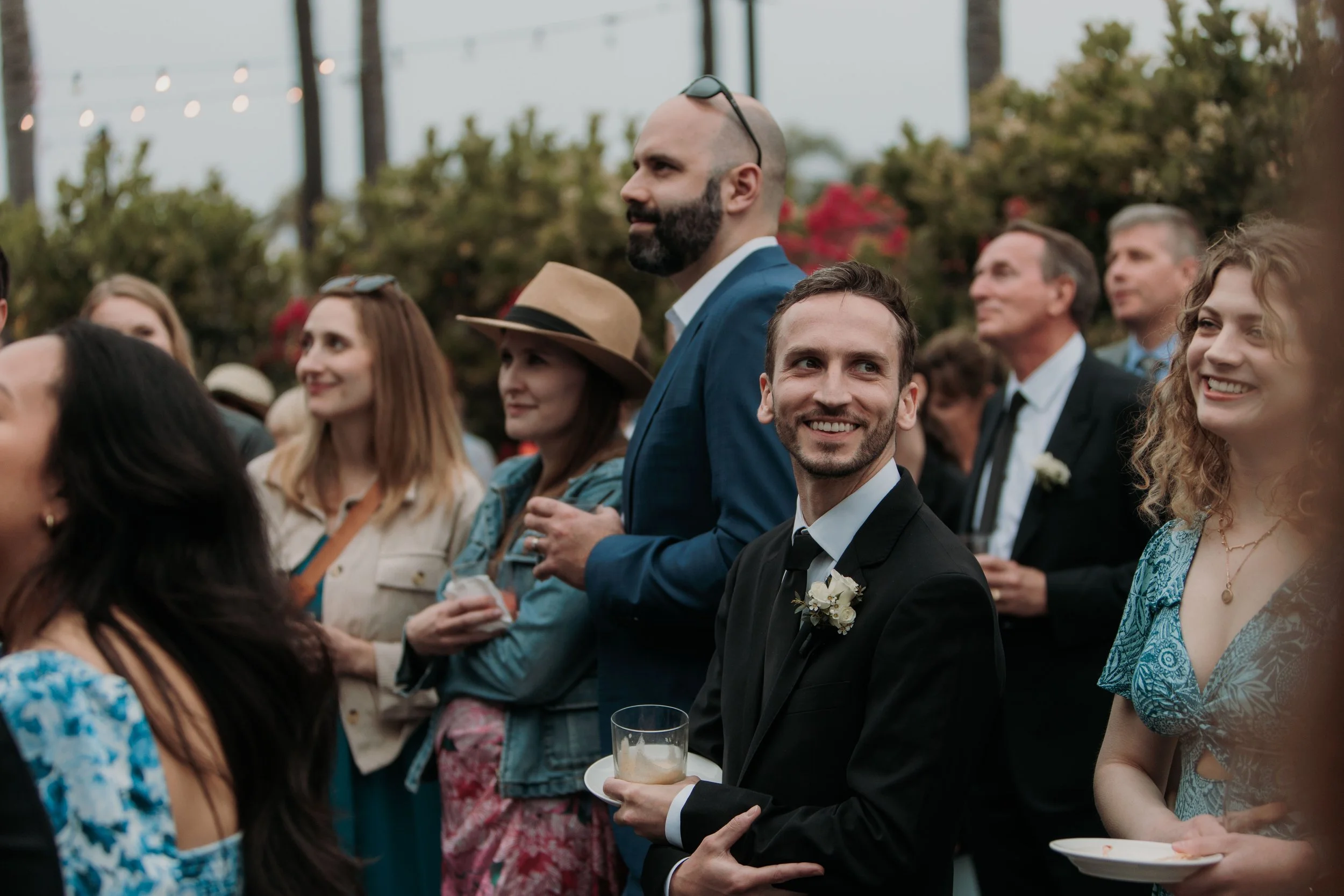 Candid photos of a wedding at The Wedding Bowl and Cuvier Club in La Jolla. San Diego wedding photography by Indigo West Photography.