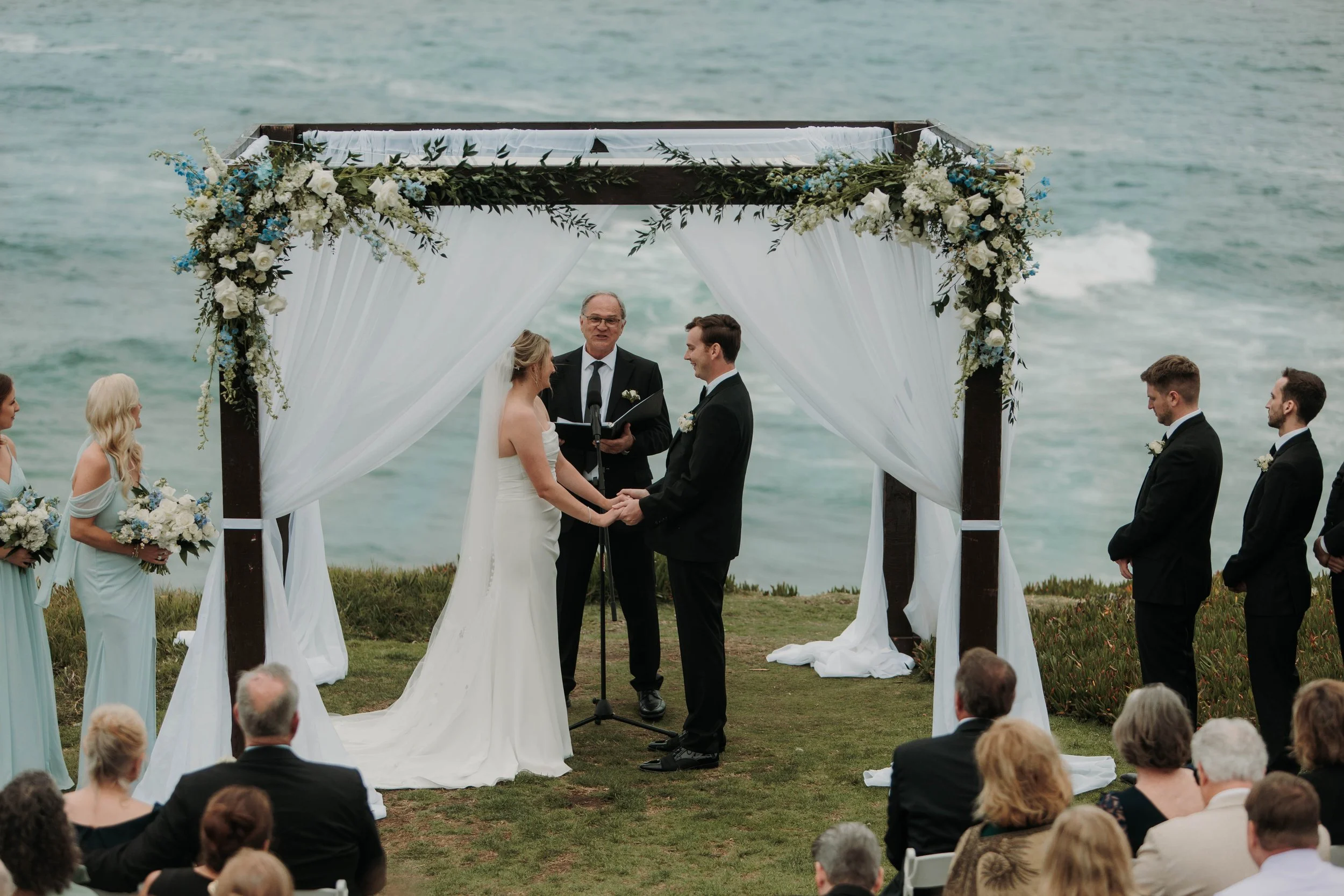 Candid photos of a wedding at The Wedding Bowl and Cuvier Club in La Jolla. San Diego wedding photography by Indigo West Photography.