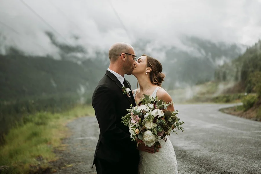 Couple kisses at their mountain wedding in San Diego County.