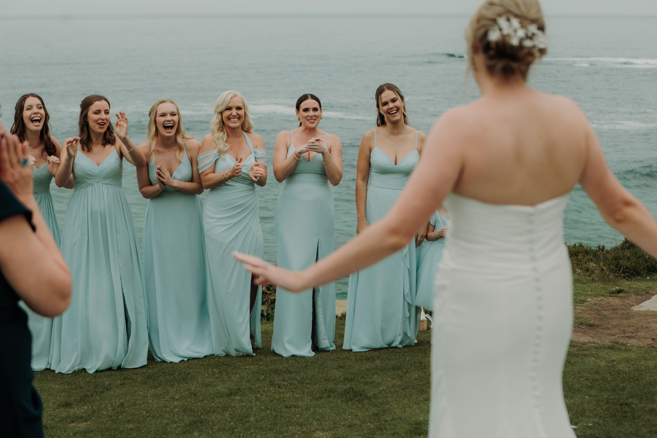 Candid photos of a wedding at The Wedding Bowl and Cuvier Club in La Jolla. San Diego wedding photography by Indigo West Photography.