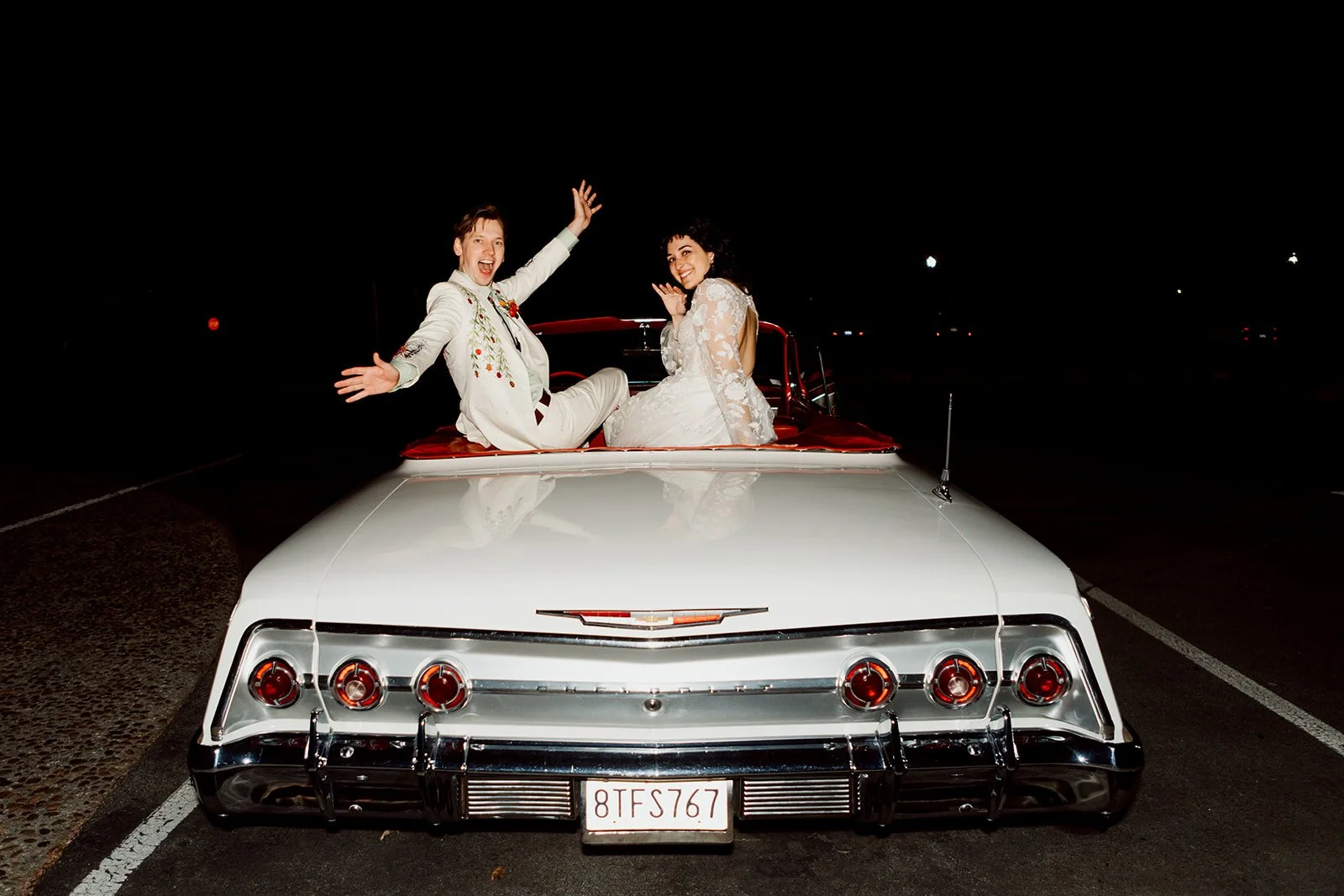 San Diego wedding photography of couple in their classic car.