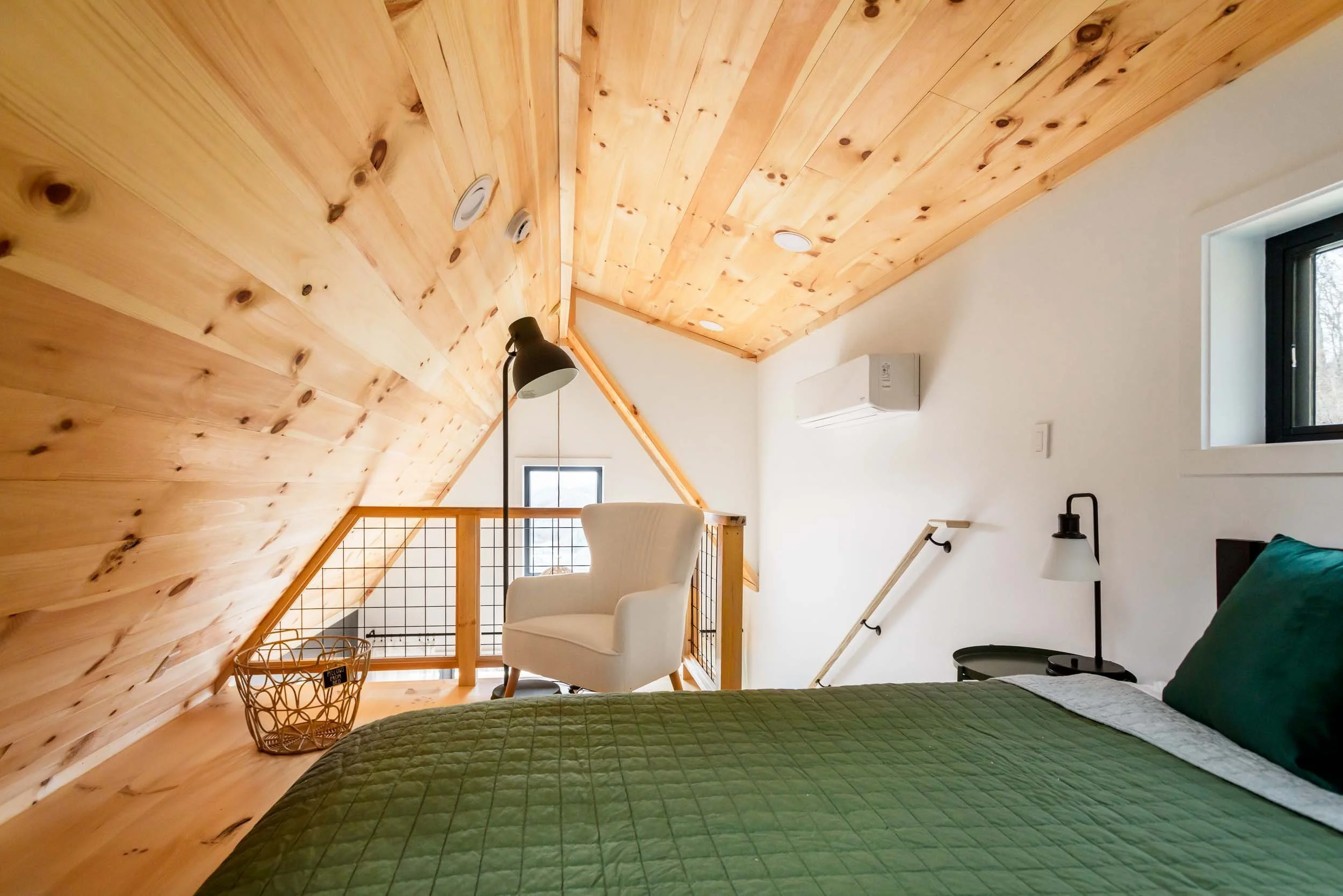Airbnb loft bedroom with queen bed.jpg