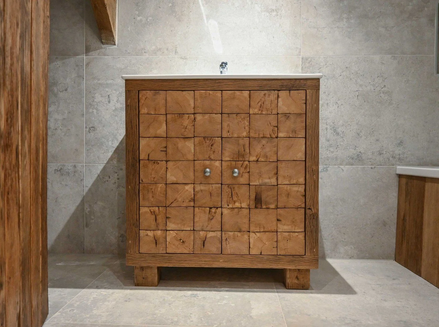 Looking through time and appreciating the growth rings in this one of a kind bathroom cabinet using an old hardwood post.