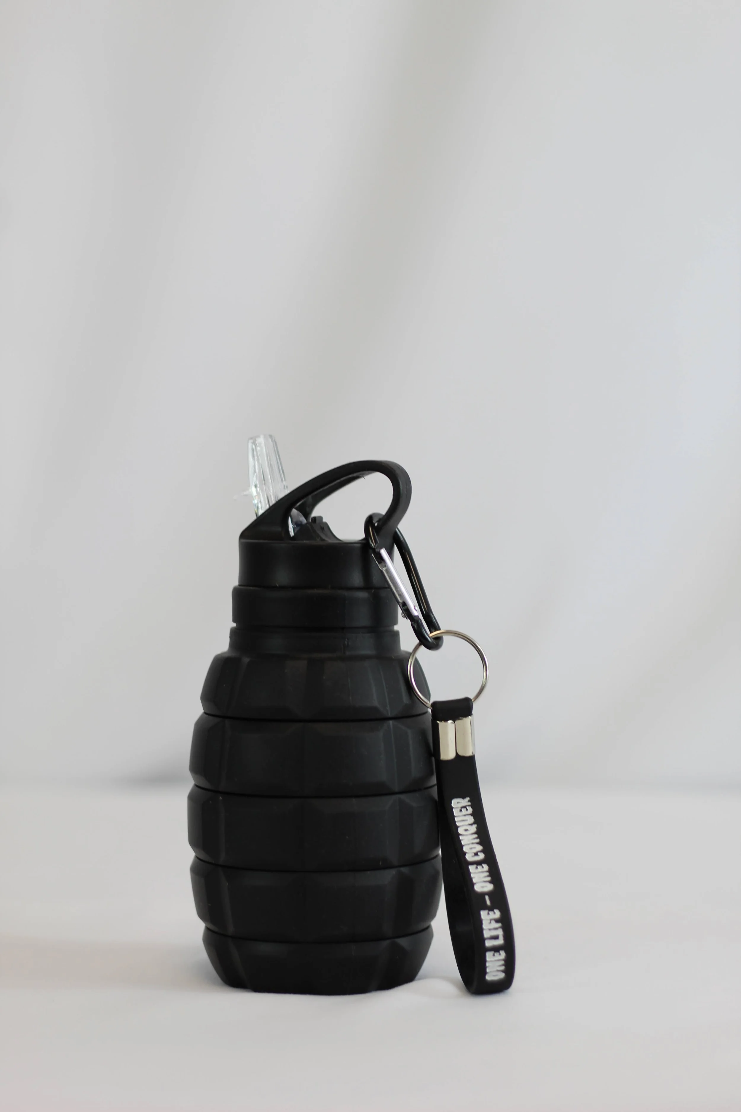 OLOC Black Grenade Bottle Callapsped Pics.JPG