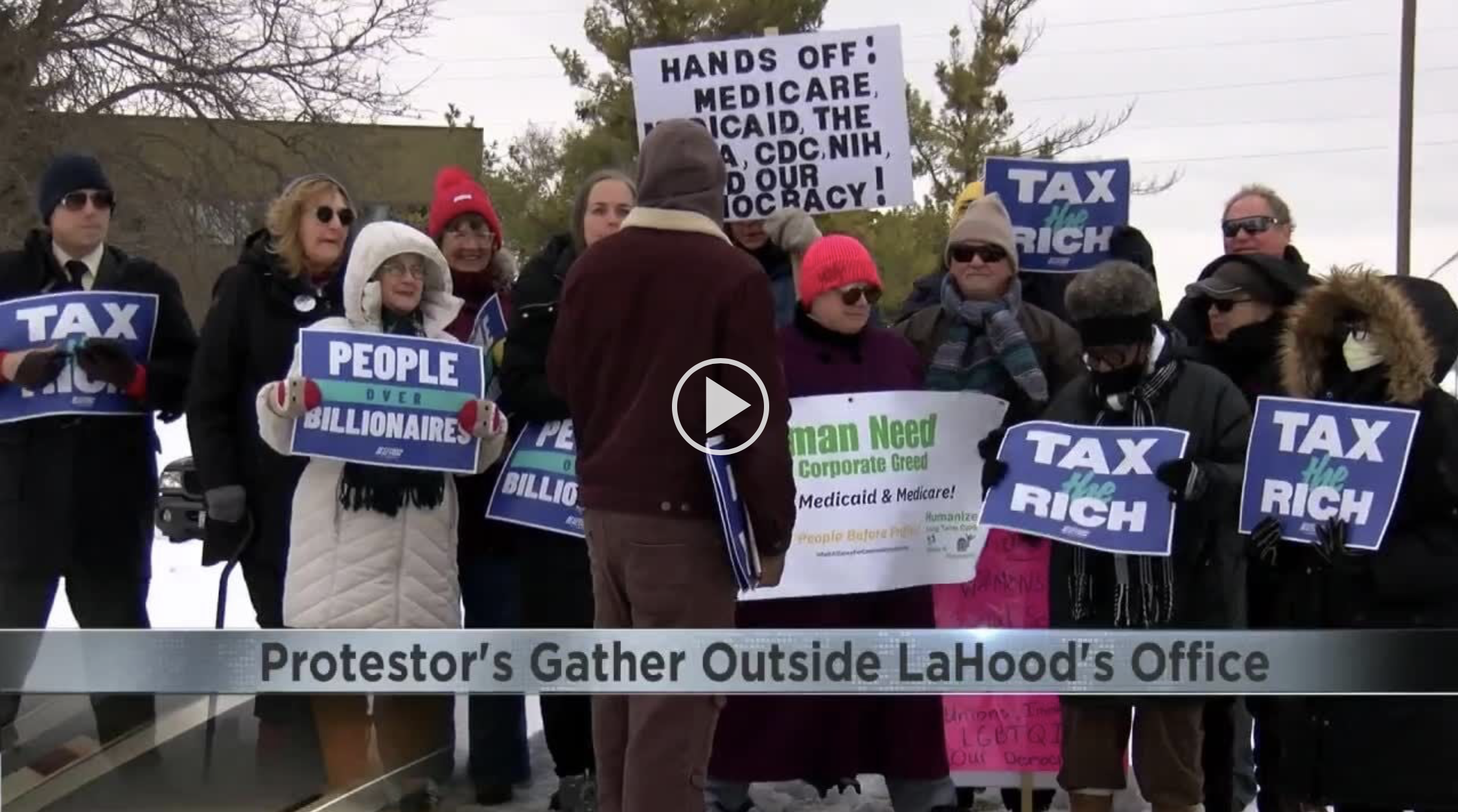 WATCH: Protestors gather outside Congressman LaHood's office in support of Affordable Care Act