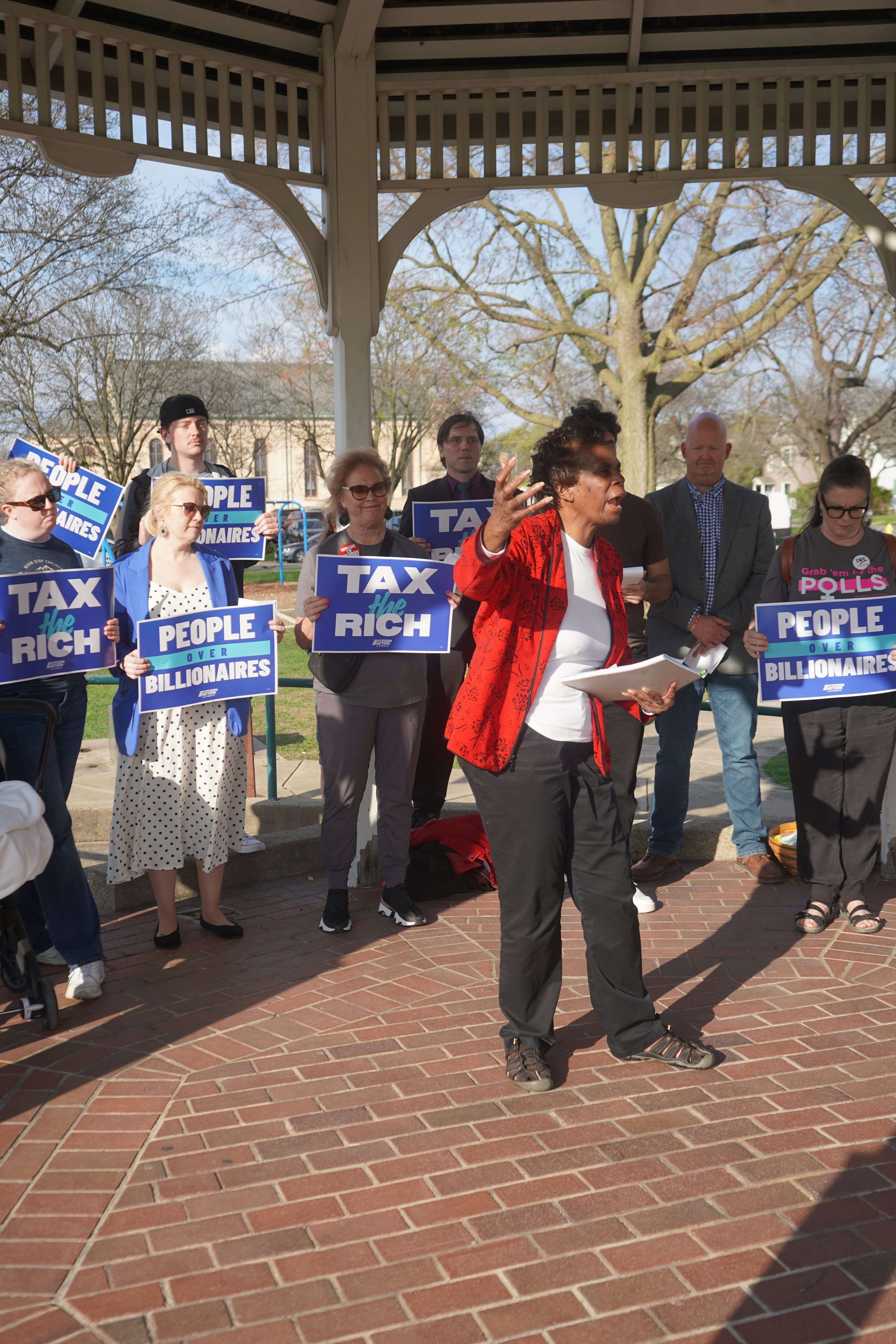 Rockford residents rally on Tax Day, call for changes to tax system