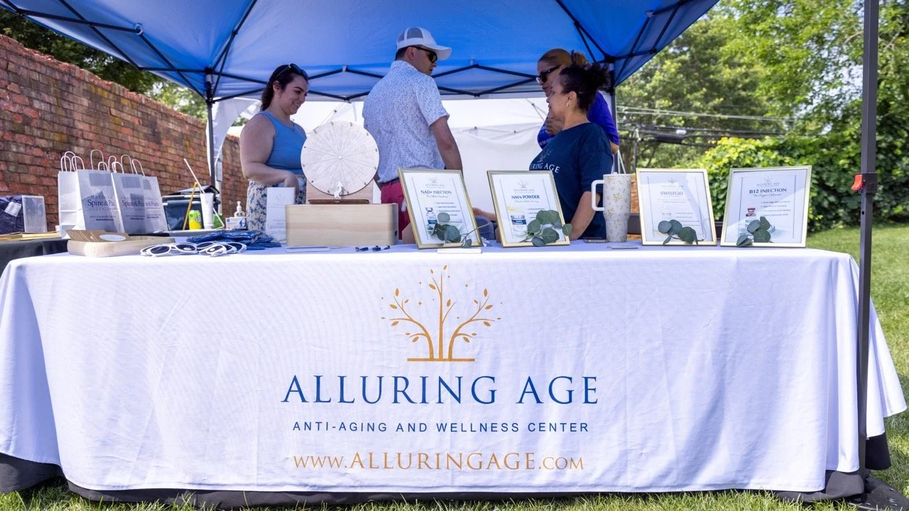 Alluring Age Vendor Booth Large.jpeg