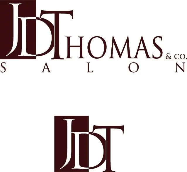Logo for JDT Thomas & Co. Salon with stylized text and initials.