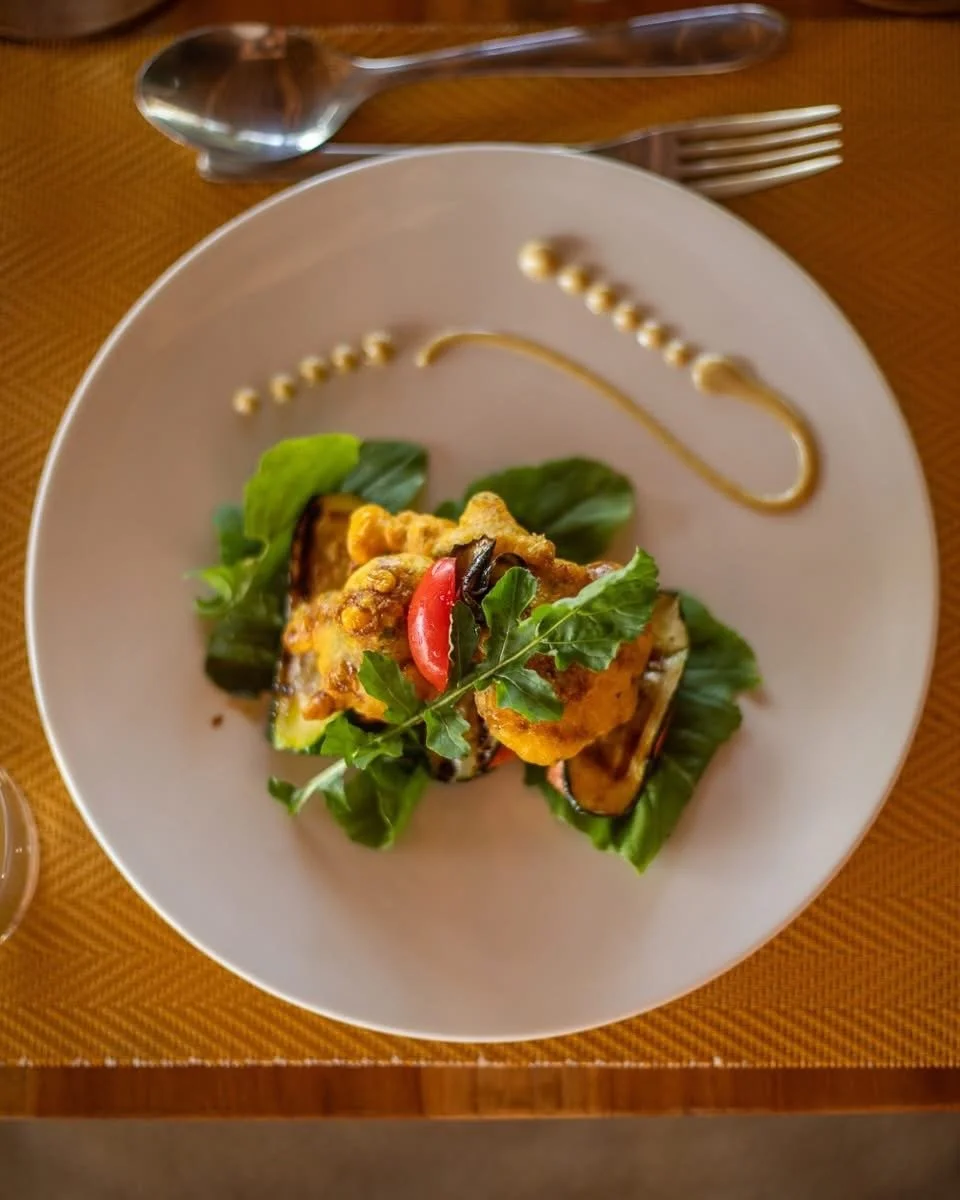 Beautifully prepared meal on a white plate
