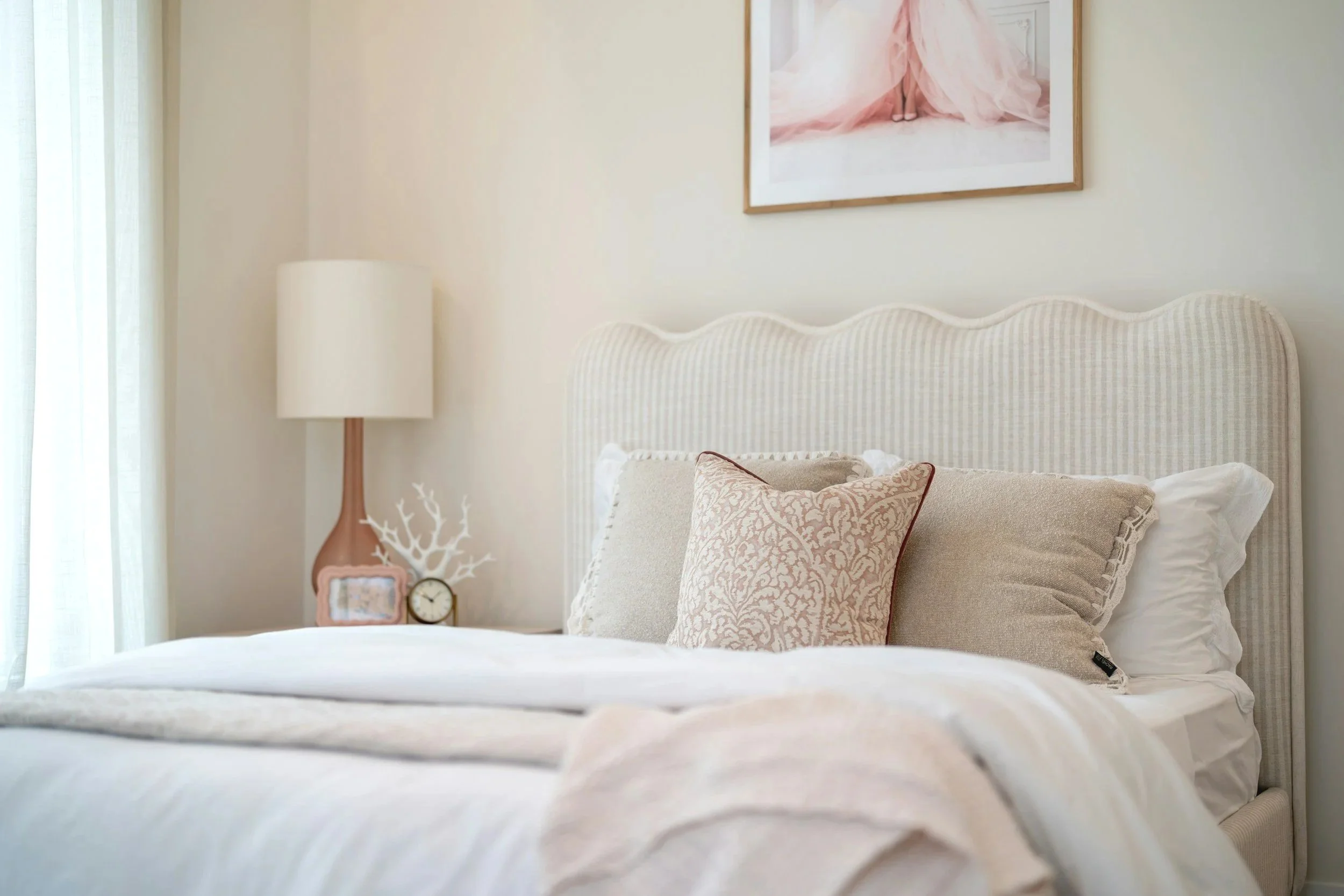 Angela Evans Professional Organizer and Owner of A Neat Day In Home Professional Decluttering and Organizing Services in the Greater Seattle Area guiding clients through the decluttering and organizing process to set up short-term rentals and airbnb