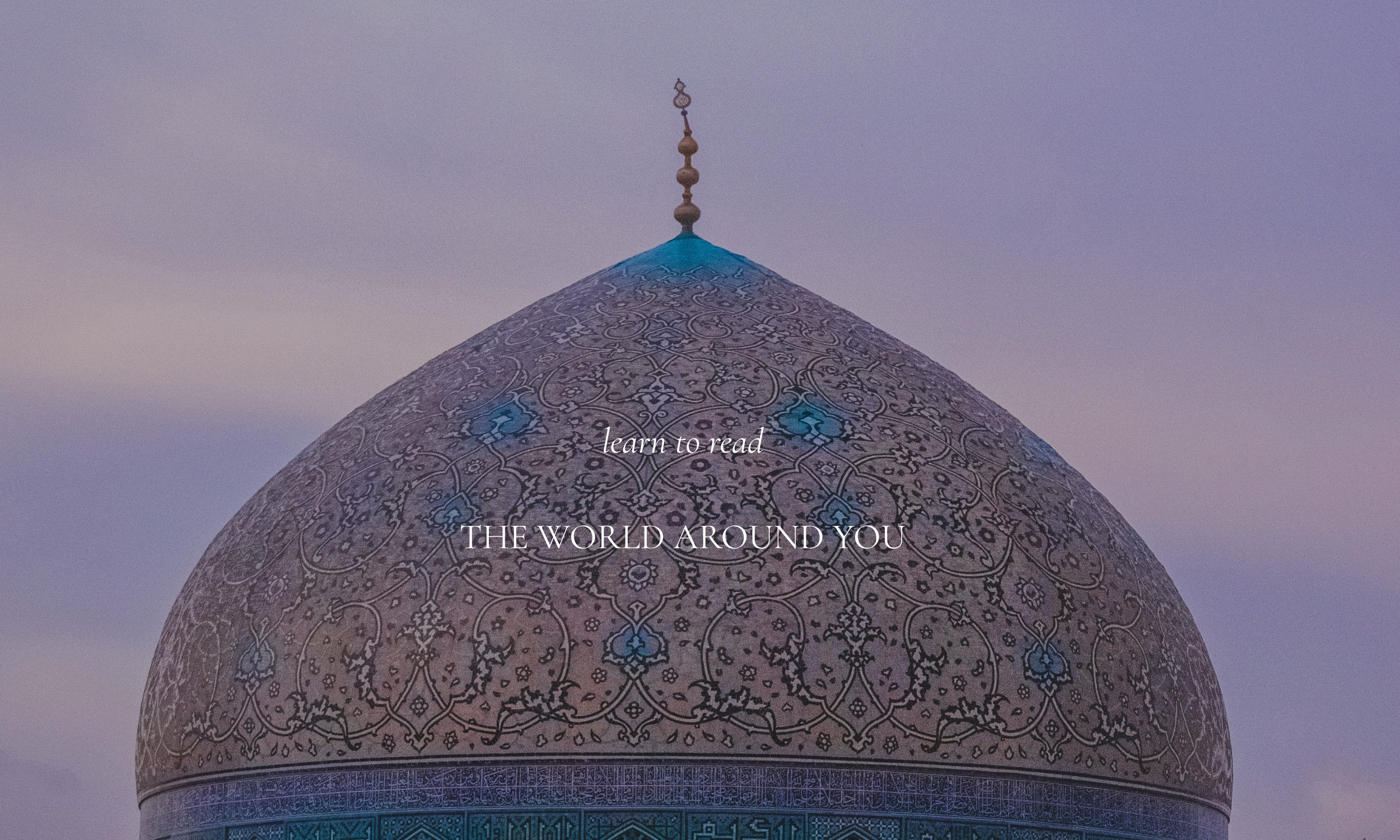 Partial view of dome at Sheikh Lotfollah Mosque (Isfahan, Iran) against blue-purple sky.