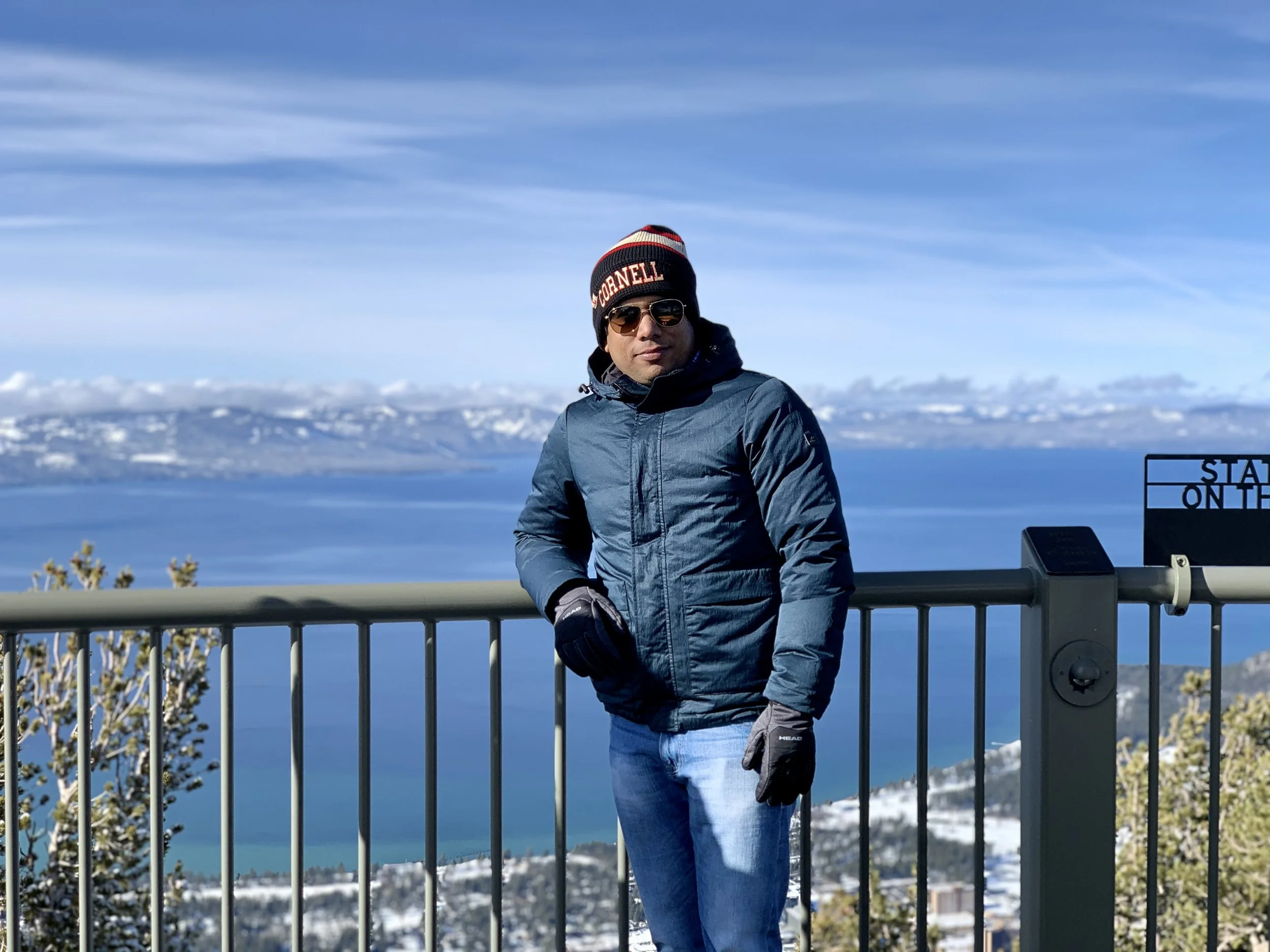 Pankaj Prasoon overlooking mountains and a lake