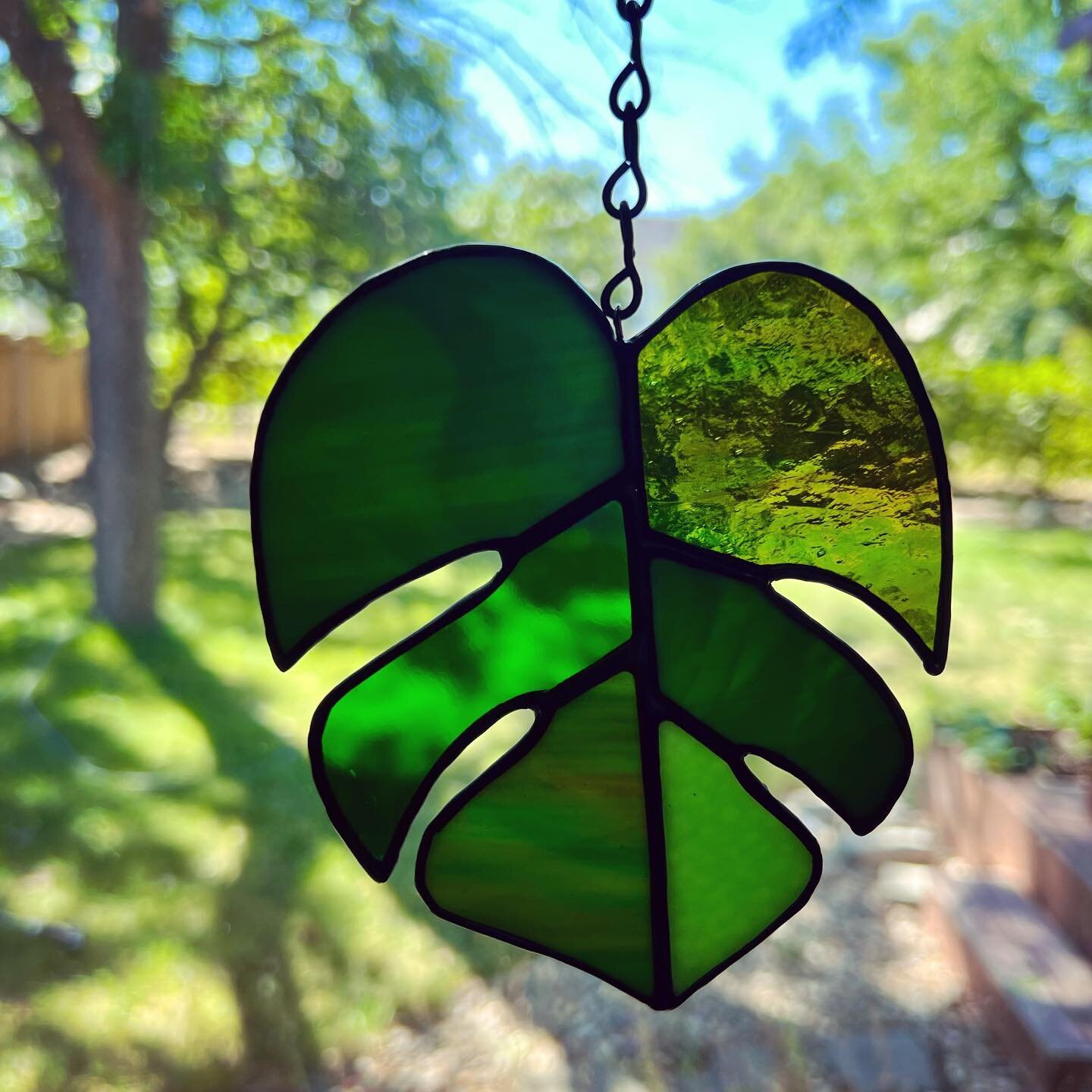 I&rsquo;m loving this bright and cheery stained glass leaf made by @cactusroseglassart 🌿 I got it at the @the.friendshop.boise pop up shop last weekend hosted by @greenacresboise ! What a treat it was to meet some local artists and crafters - it&rsq