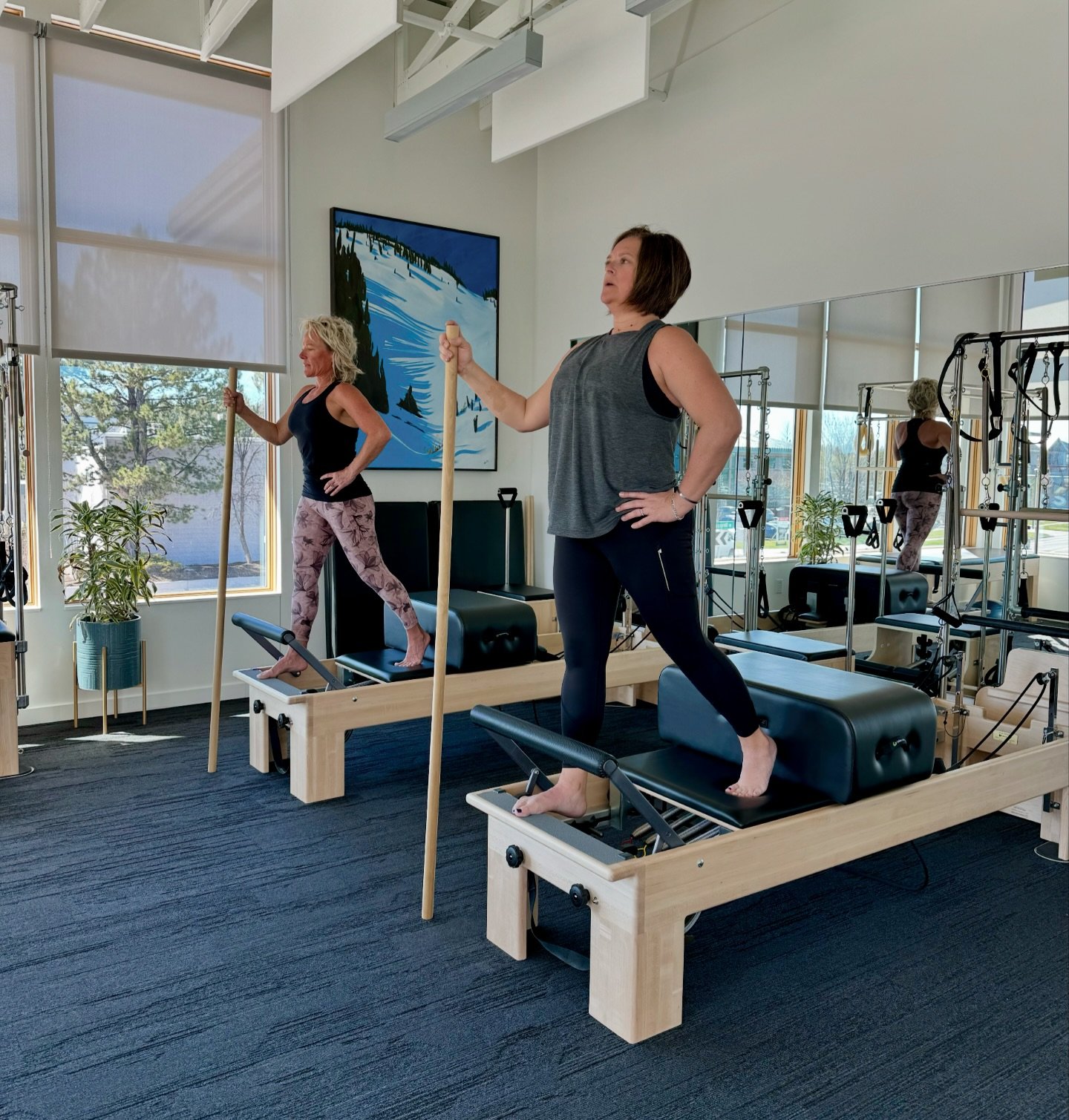 Beautiful day in the Bend studio - awesome duo Meg &amp; Carrie showing us some lovely Front Splits on the Reformers 🤩  The space has so much natural light, it has such good energy and so do all of the people who are part of this special place #pila