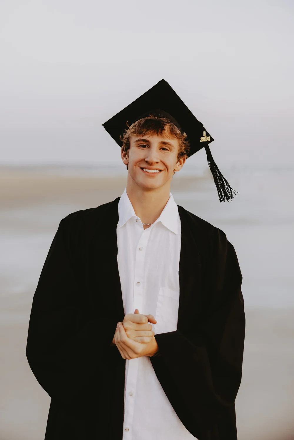  guy senior photos cap and gown 