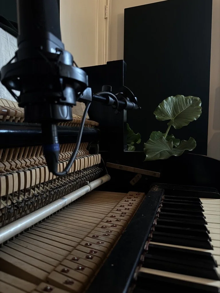 Vintage Baldwin upright piano miked for recording in Nashville music production studio