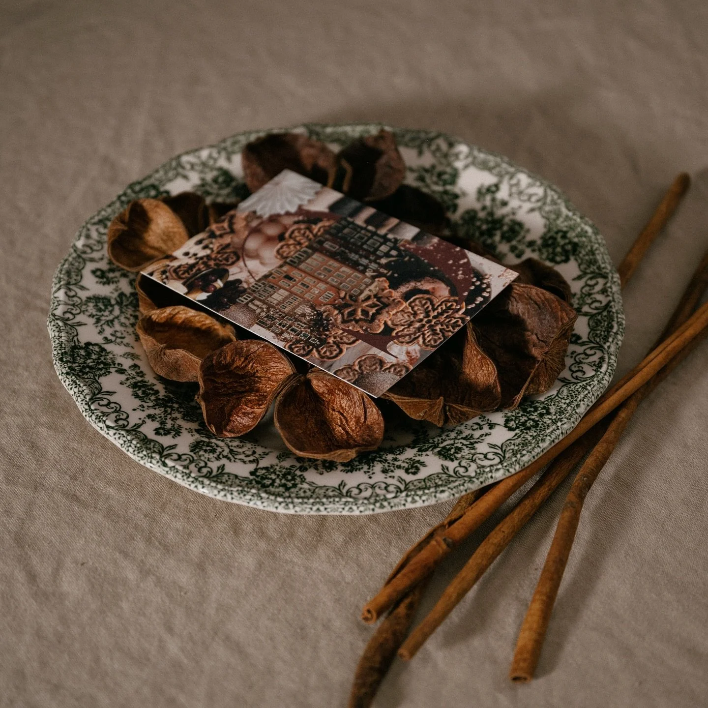 These postcards grew from the moments and traditions I hold dear at Christmas. The warm scent of gingerbread, a recipe passed down through centuries from medieval Europe, brings a taste of history and comfort to each card. Star-shaped anise whispers 
