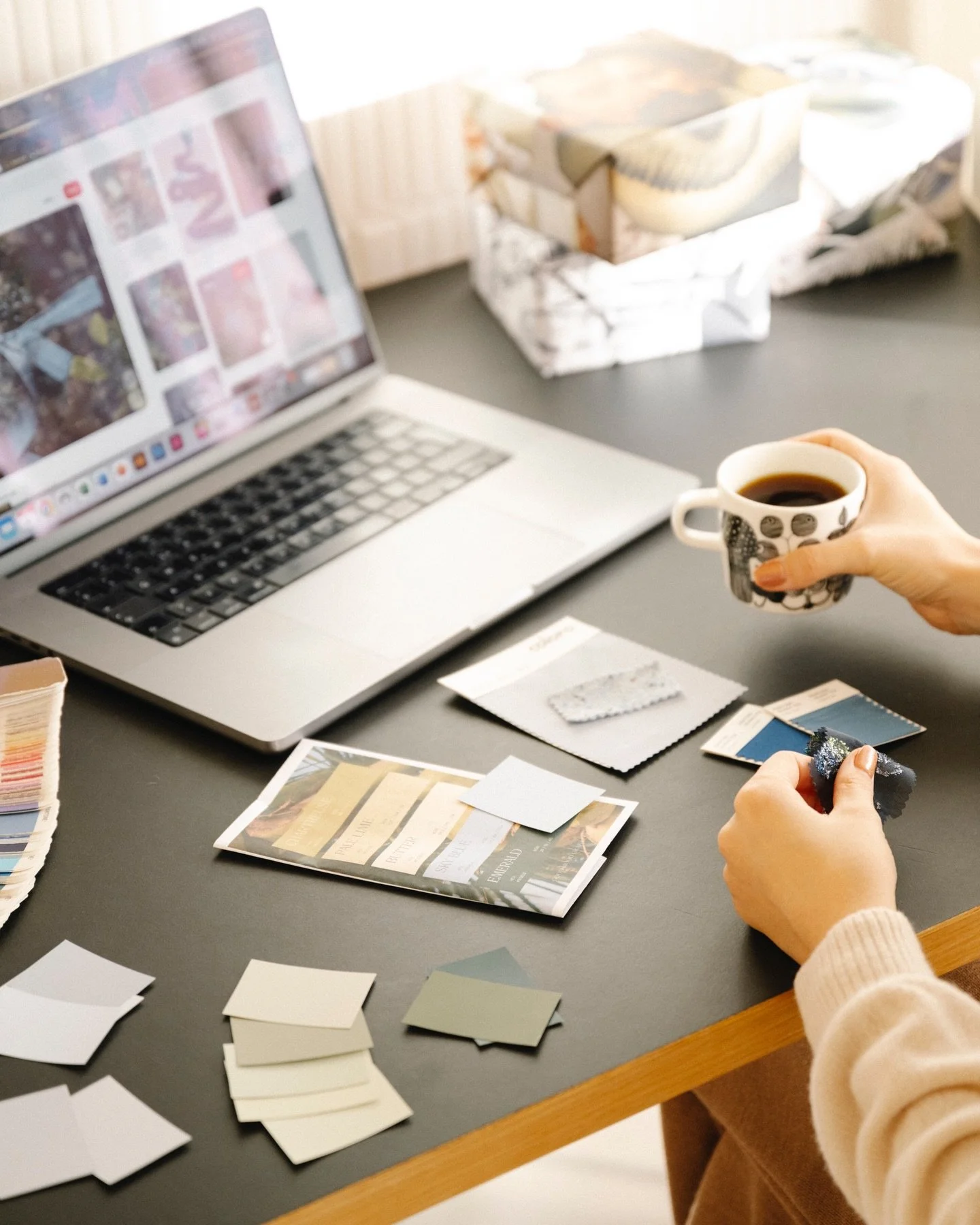 My mornings are very rarely identical. But, when I have the time, I return to the same small scene.

A cup of coffee. A clear table. And colour cards, as well as paper samples laid out like a quiet invitation.

Before the emails, before all the noise
