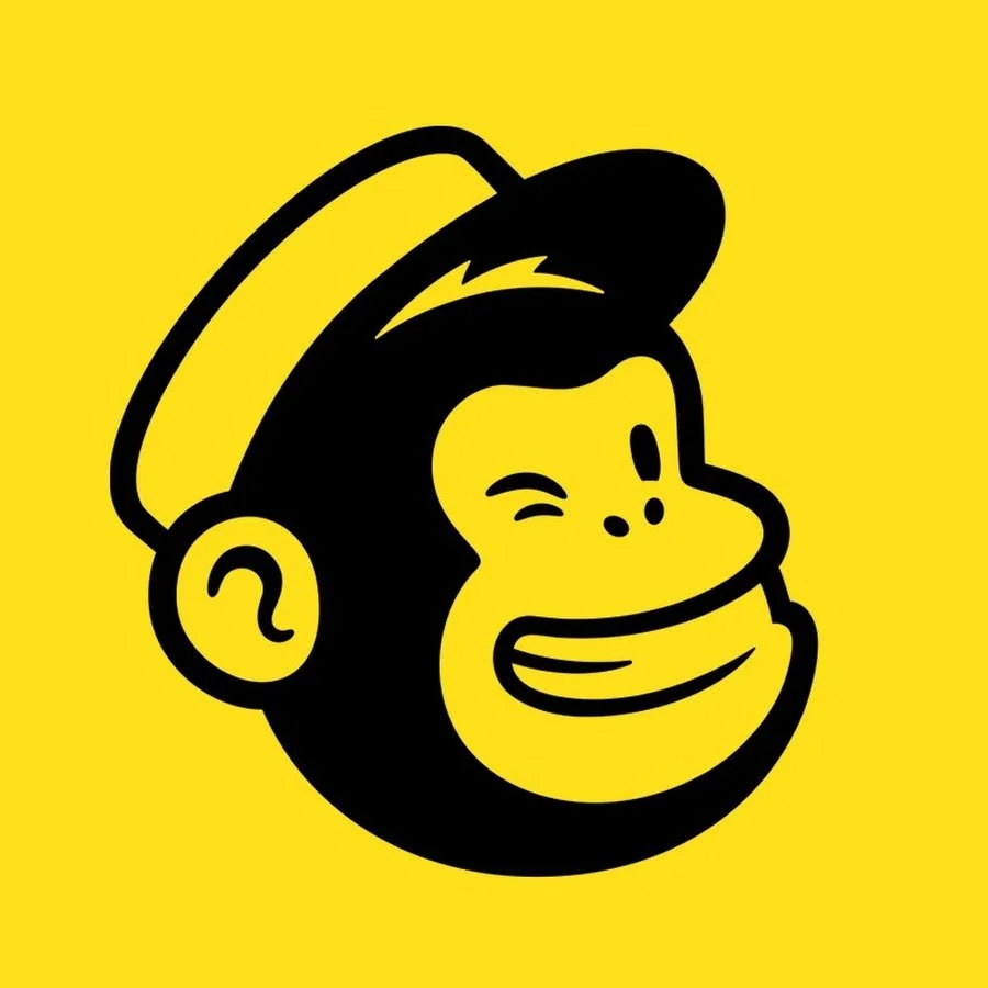 Jarrah Wallace - Kajabi Systems & Automations Partner.  A stylized cartoon face of a smiling monkey wearing a hat, with a yellow background.