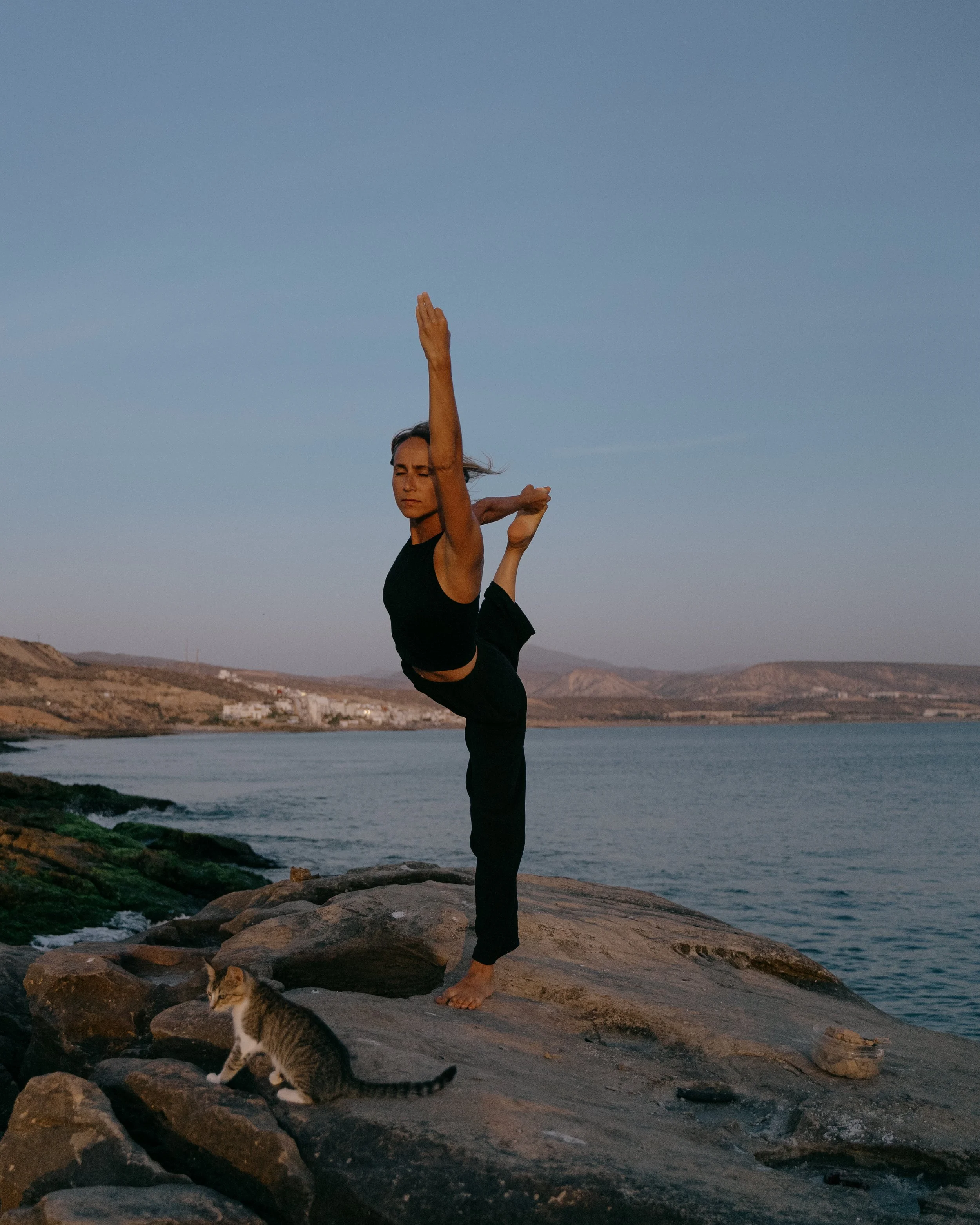 Nambin in Yoga Dancers Posture by the ocean