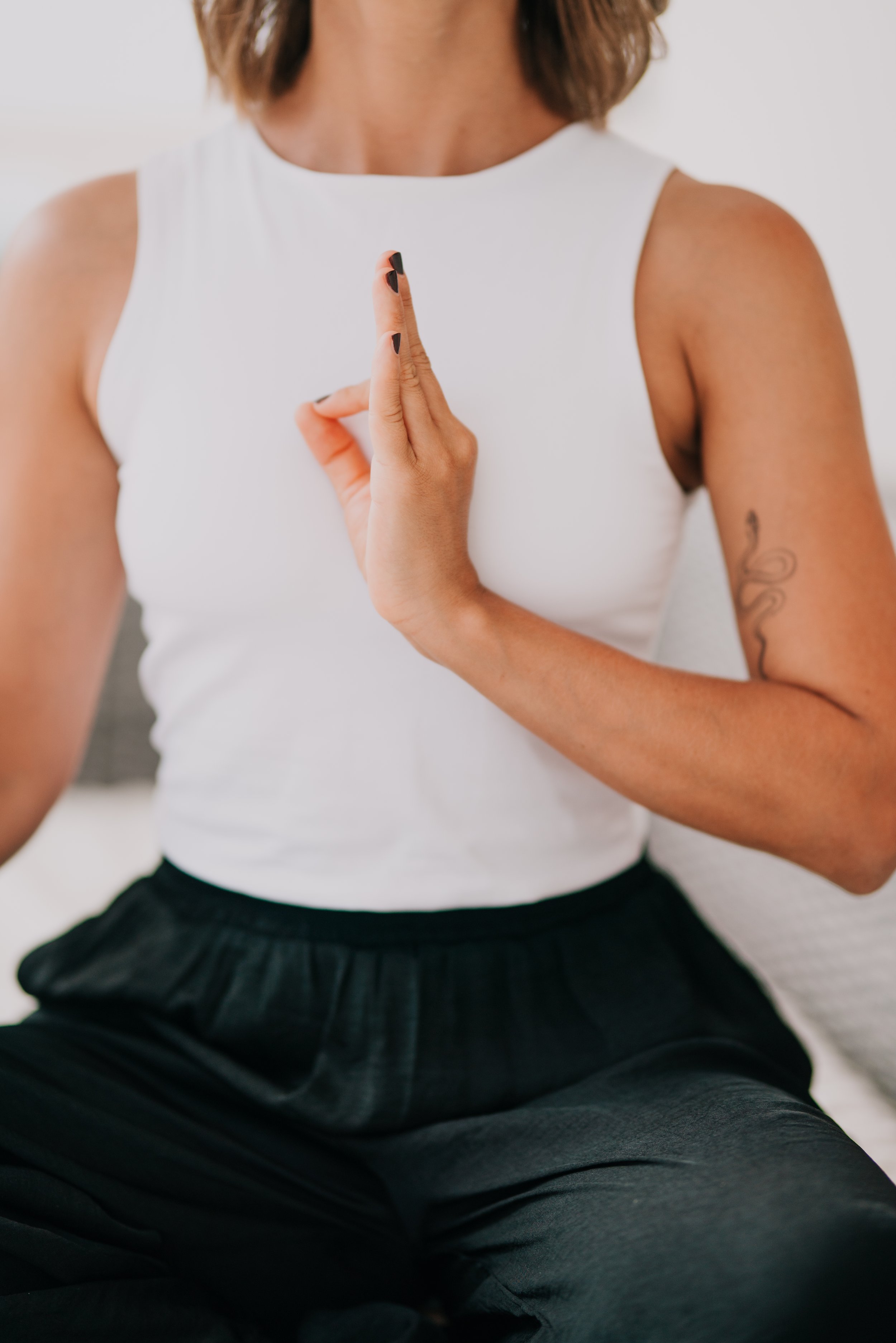 Burnout coach and somatic practitioner offering online nervous system regulation for high-performing professionals.