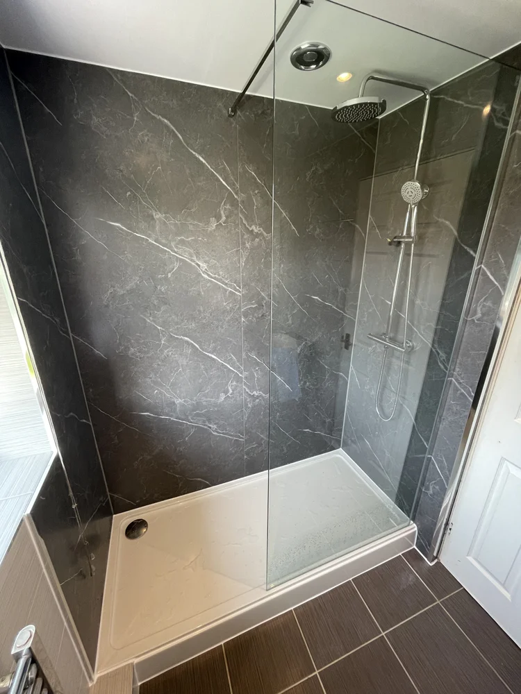 After renovation, bath-to-shower project 73