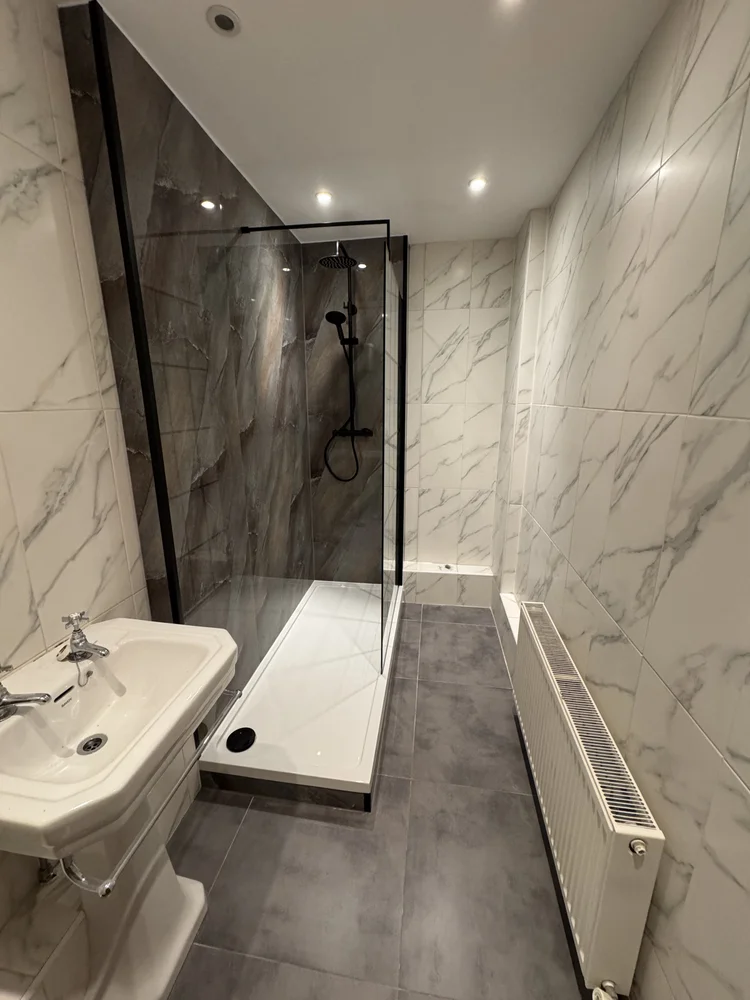 After renovation, bath-to-shower project 56