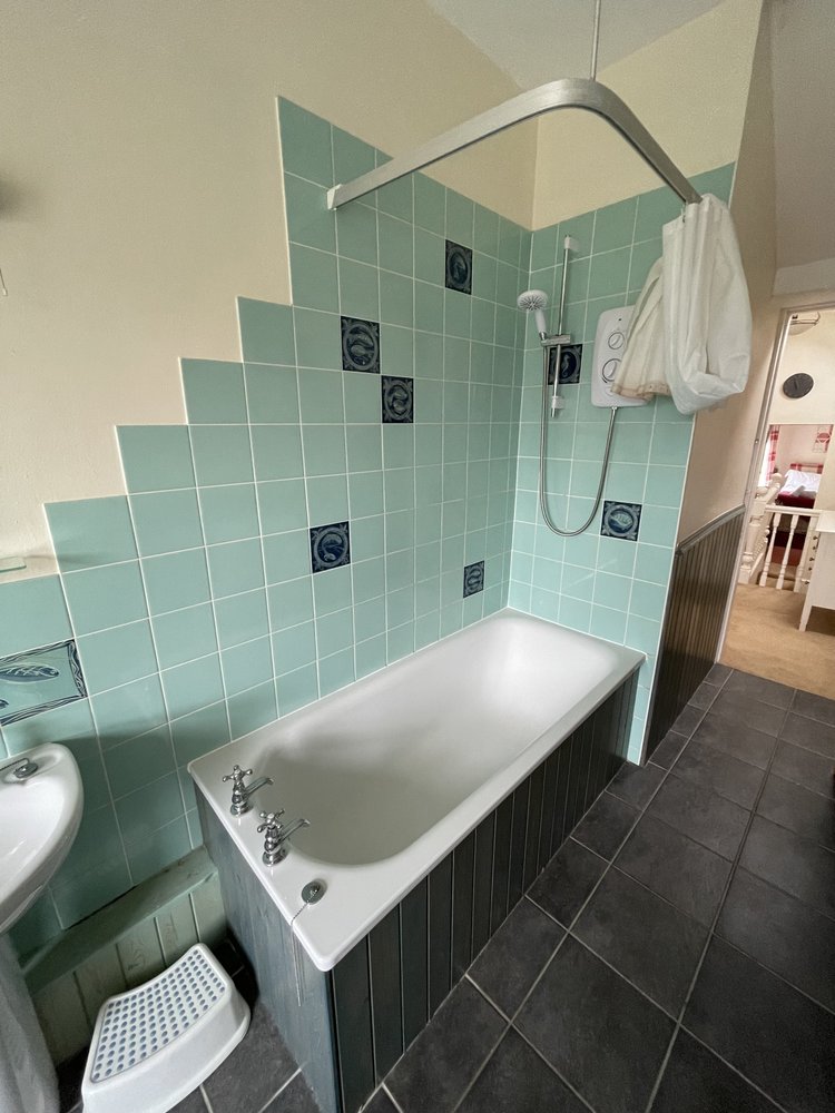 Before renovation, bath-to-shower project 107
