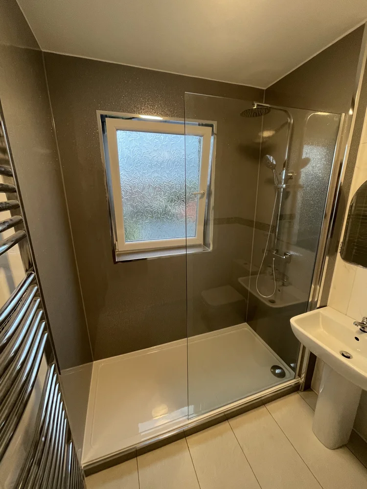 After renovation, bath-to-shower project 118
