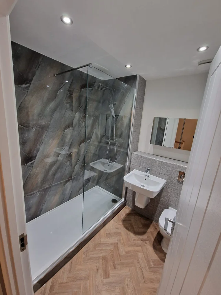 After renovation, bath-to-shower project 125