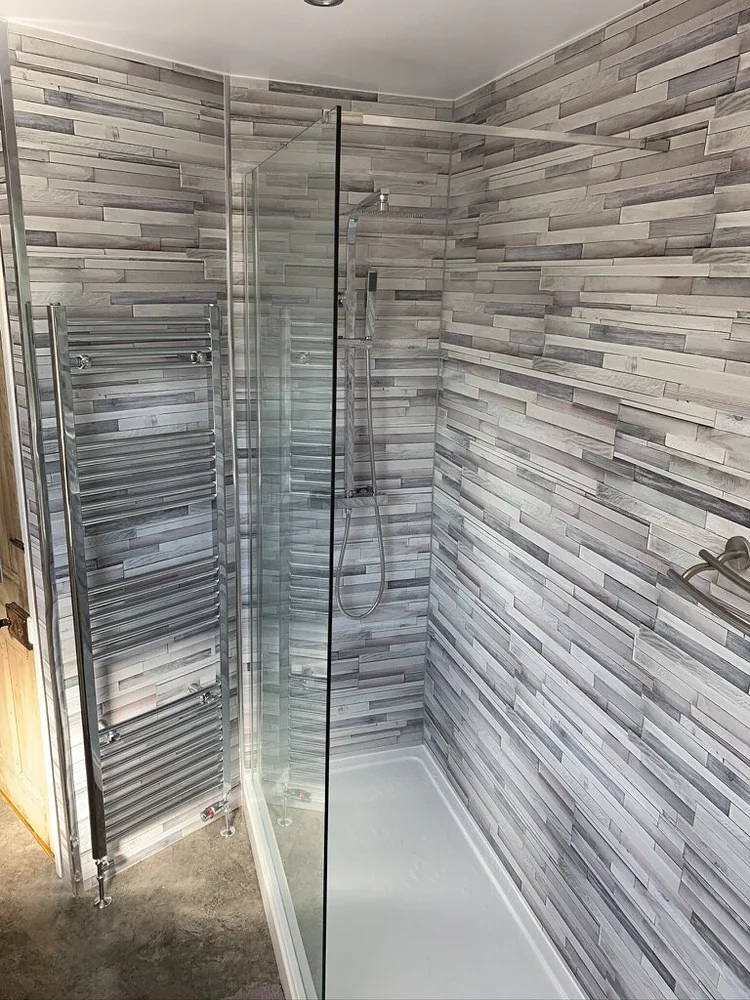 After renovation, bath-to-shower project 129