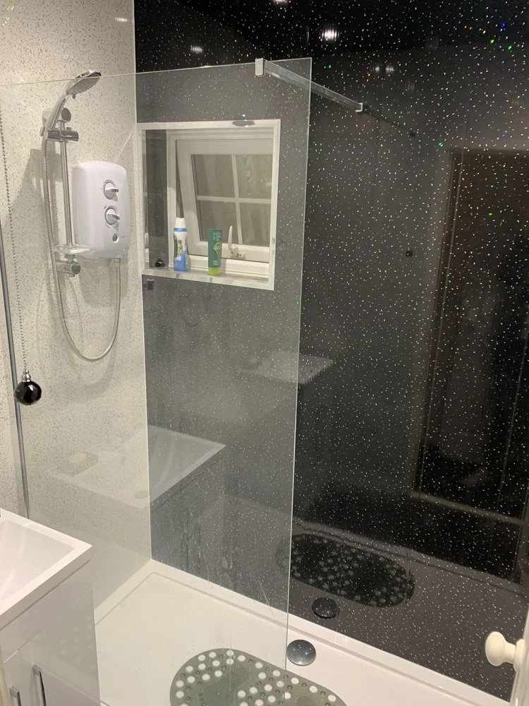 After renovation, bath-to-shower project 132