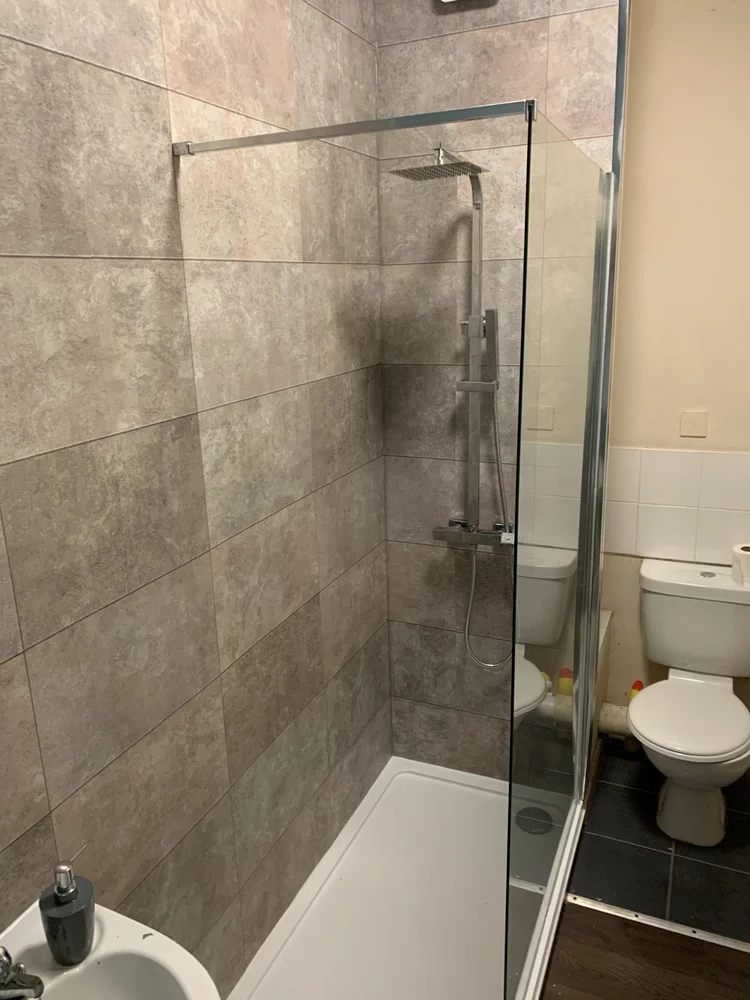 After renovation, bath-to-shower project 131