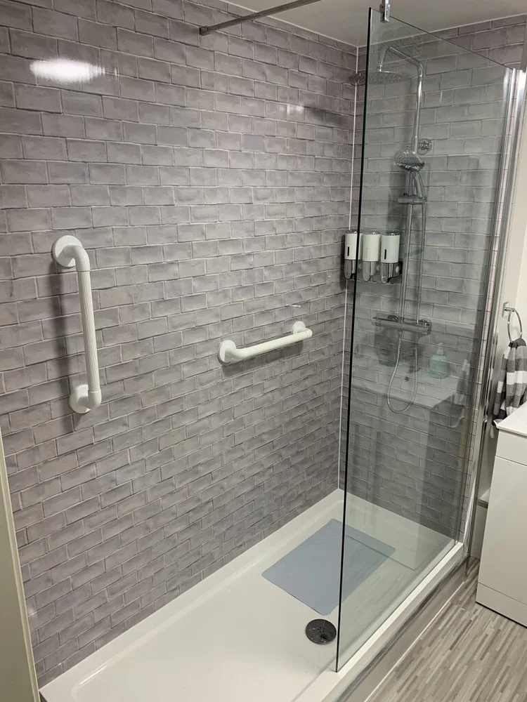 After renovation, bath-to-shower project 133